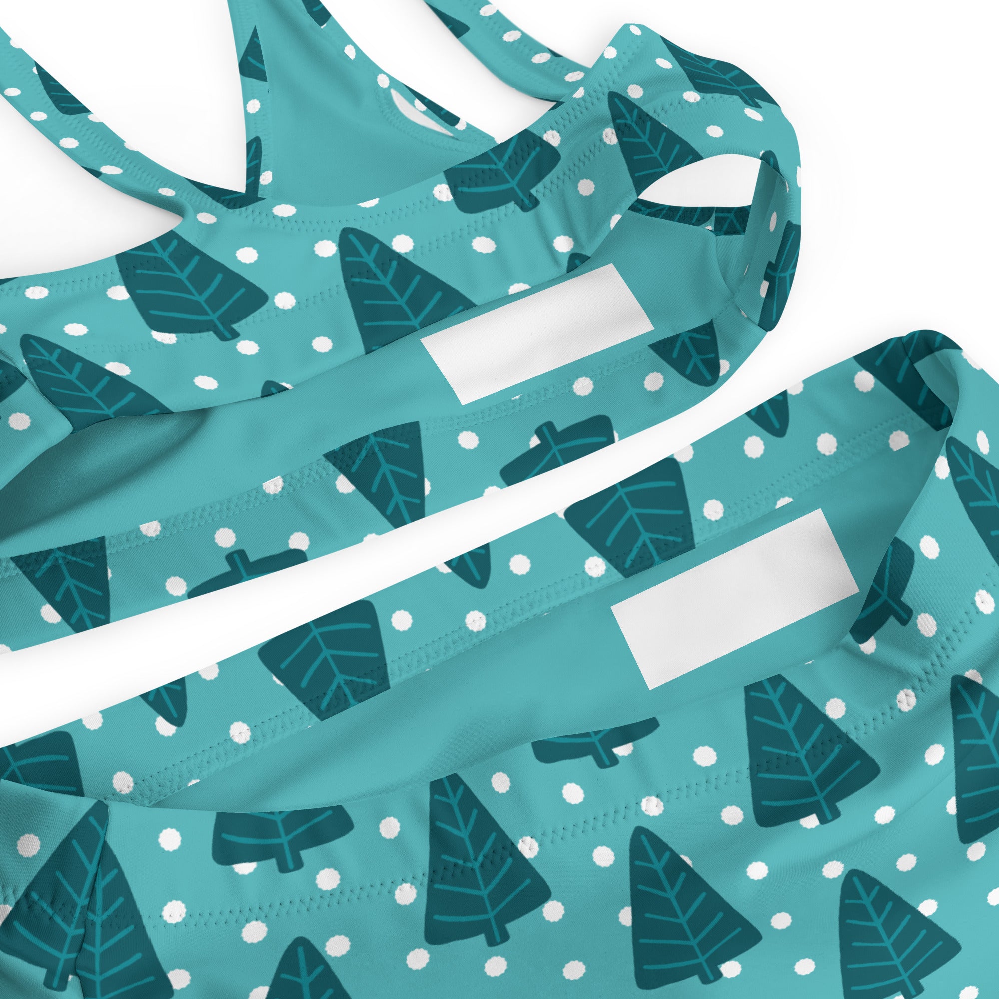Women’s teal and white leaf-patterned recycled bikini top with dotted accents quick drying fabric upf 50+