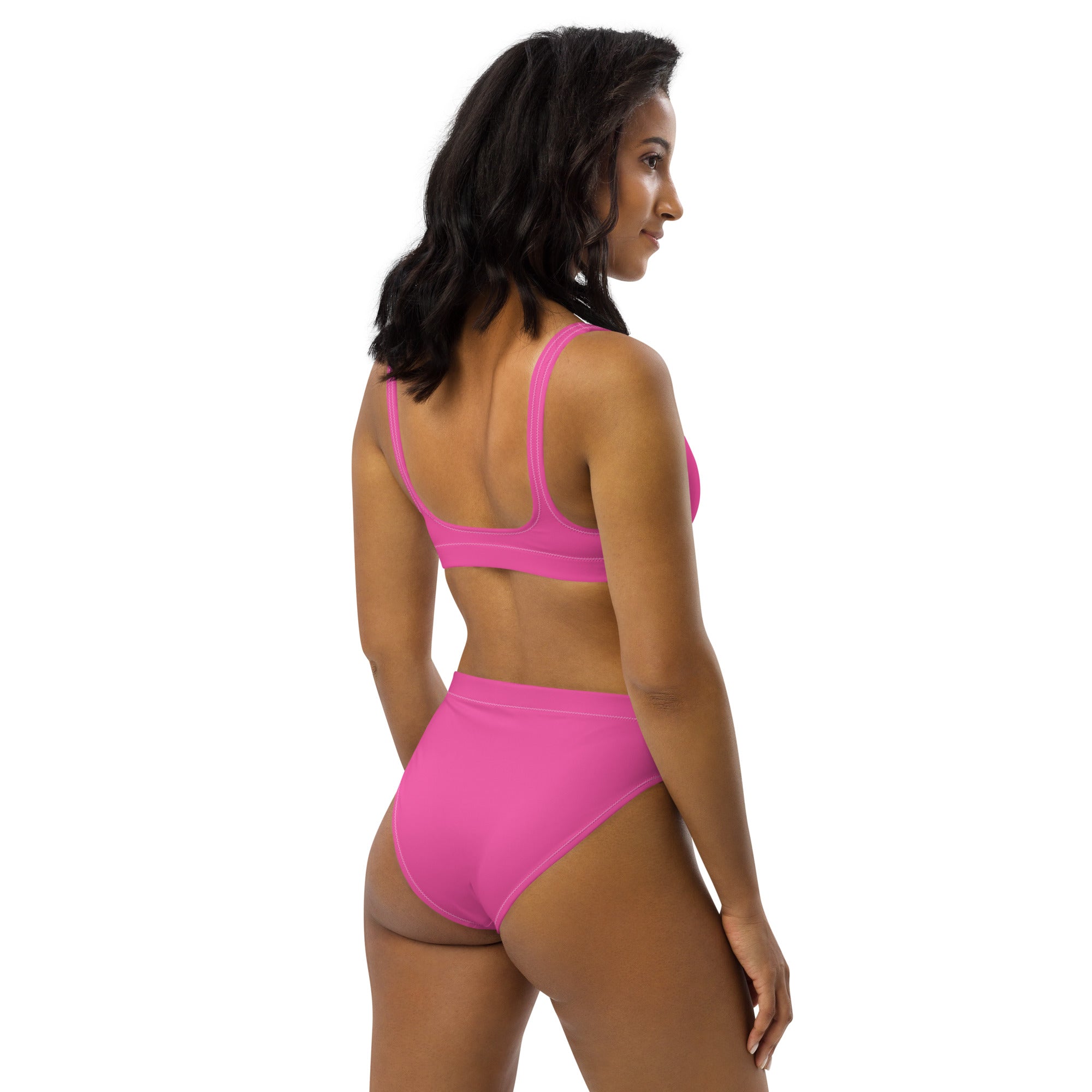 Bright pink padded two-piece bikini with high-waisted bottoms made from quick drying recycled fabric with UPF 50+