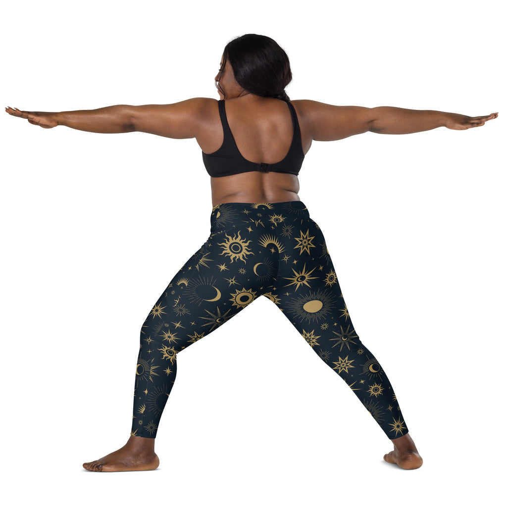 Dark blue women’s celestial sun and moon yoga leggings with pockets high waisted soft compression pants with gold stars