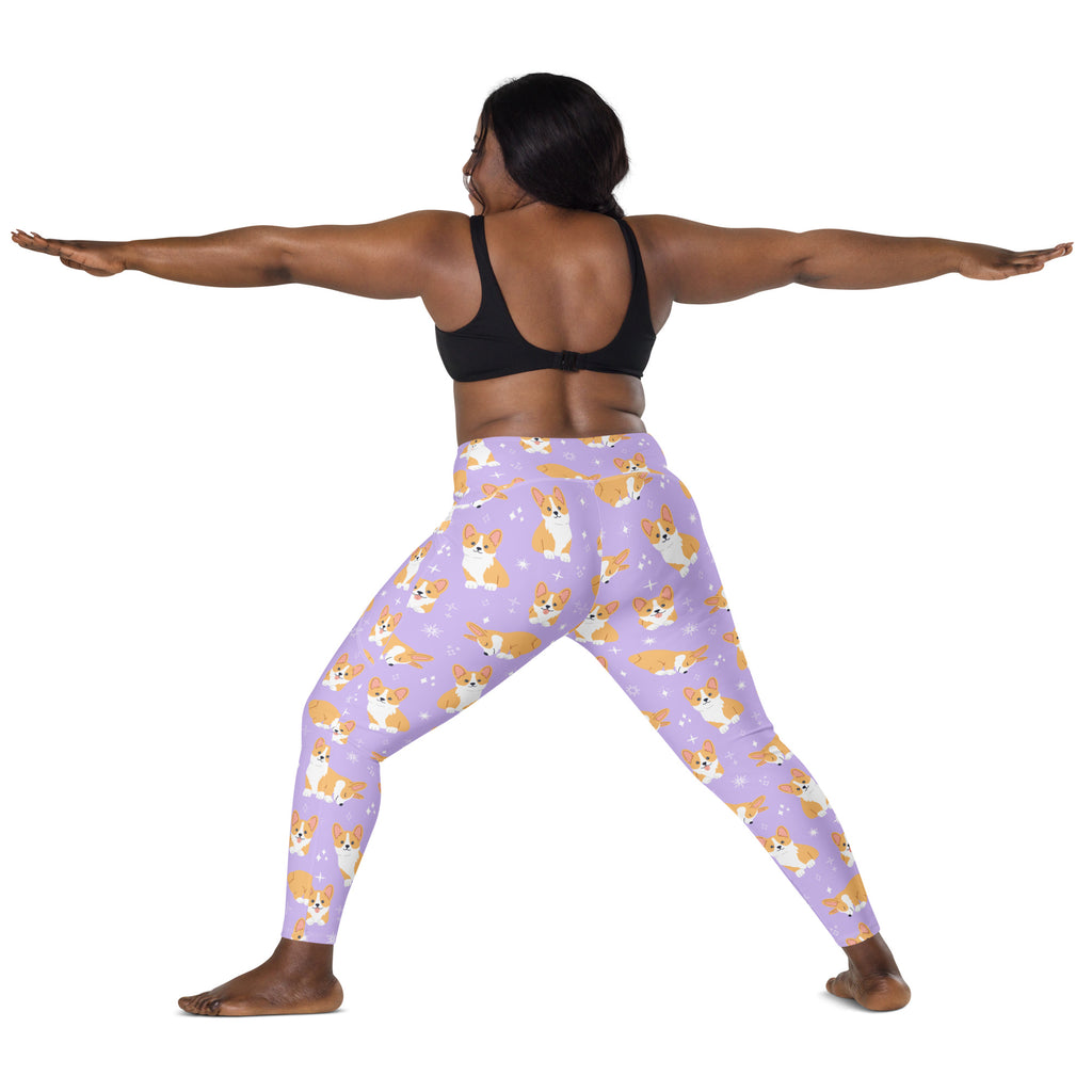 Women’s purple high waisted yoga leggings with soft compression and pockets featuring tan and white cartoon corgis pattern