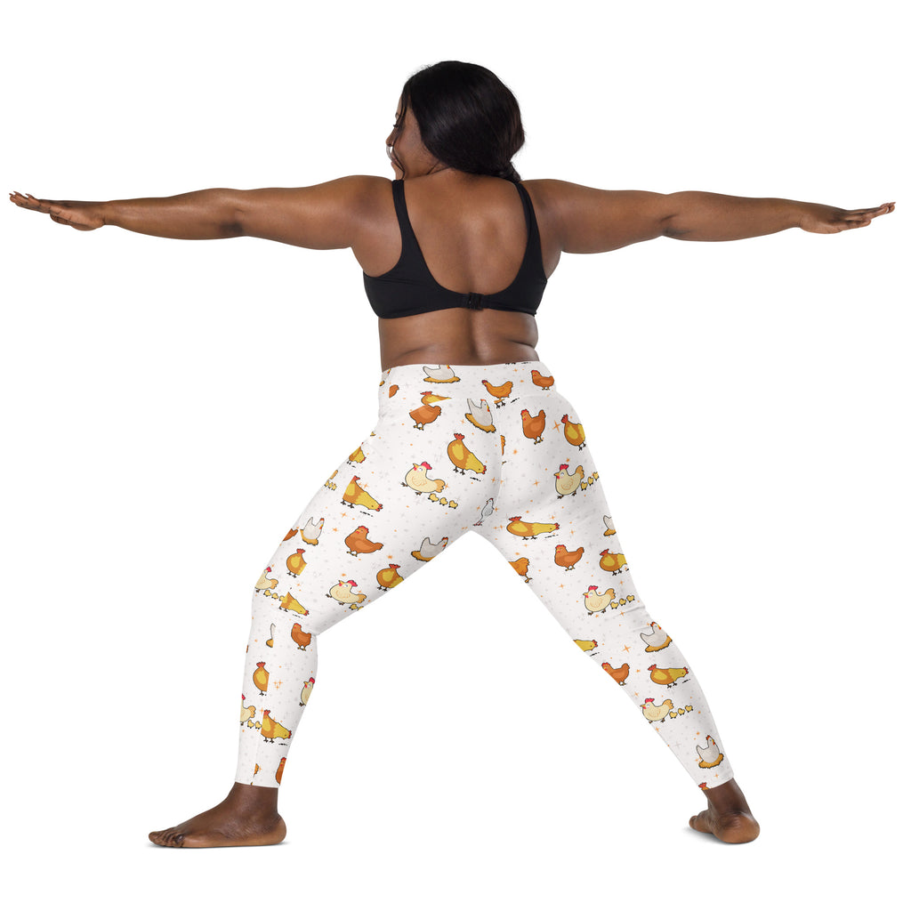 White high-waisted chicken yoga leggings with pockets featuring playful brown yellow and white cartoon chicken pattern