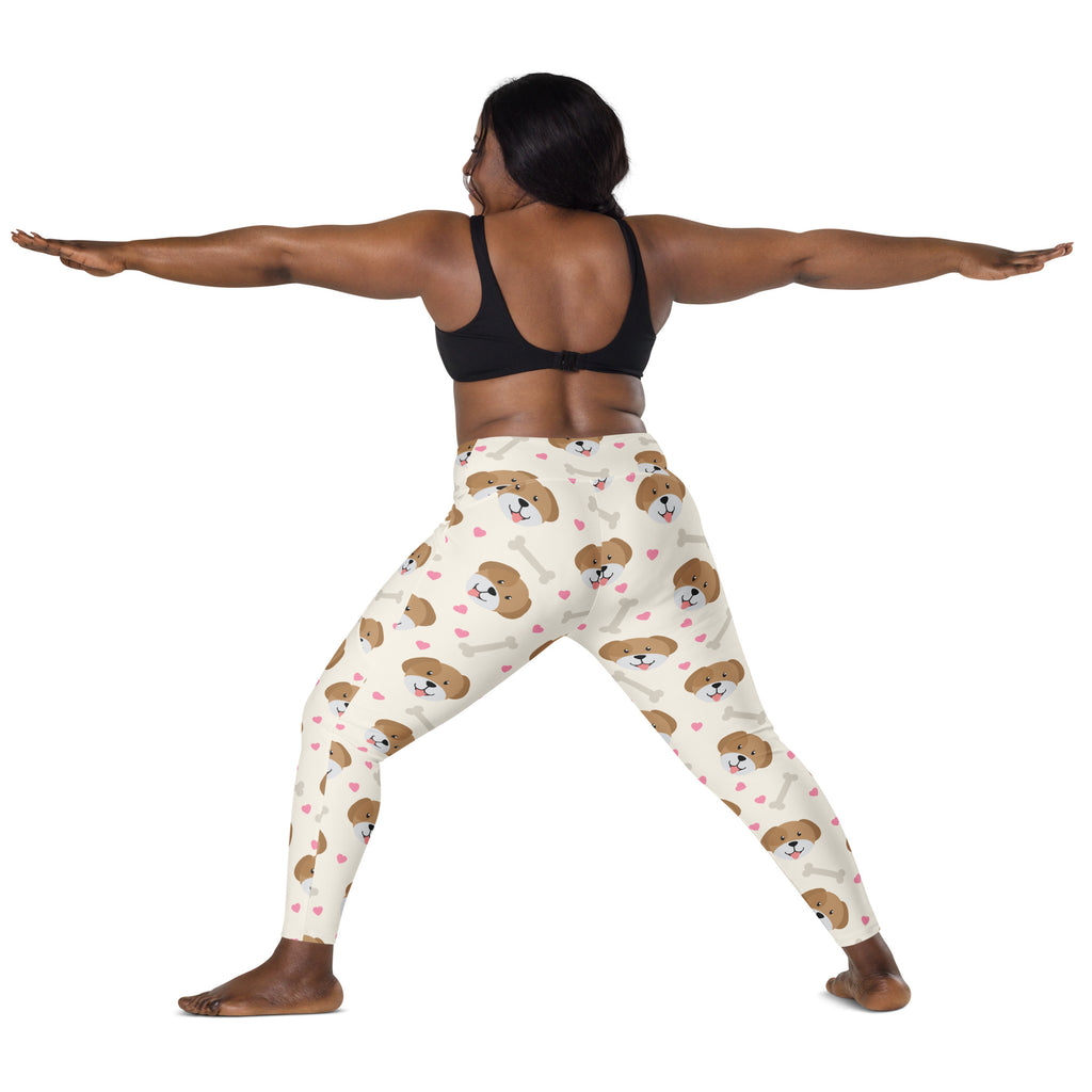 Women’s cream-colored cute dog yoga leggings with pockets featuring brown puppy faces pink hearts and white bones pattern