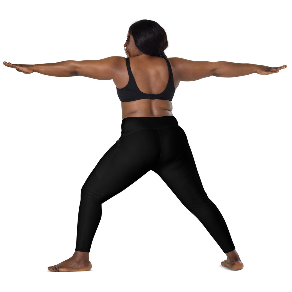 Women’s black high-waisted seamless yoga leggings with pockets made of soft compression fabric for active wear