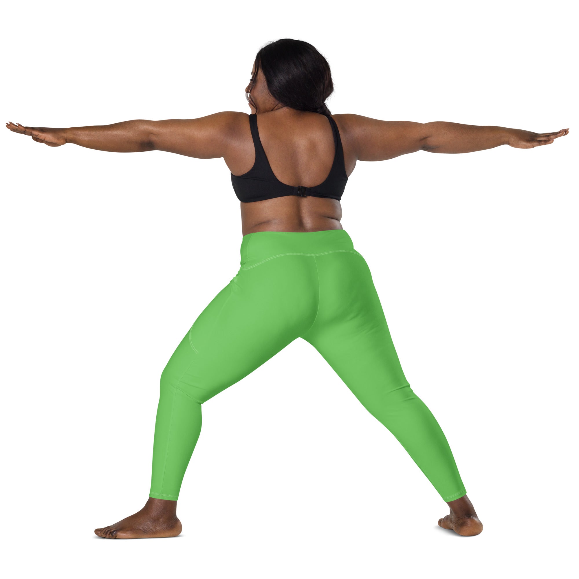 Women’s bright green high-waisted yoga leggings with pockets soft compression fabric for active wear
