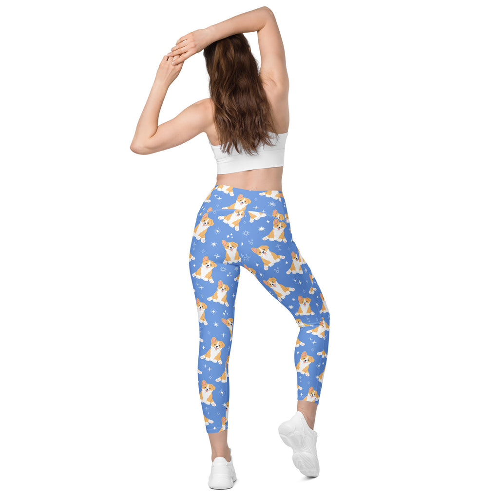 Women’s blue high-waisted corgi dog yoga leggings with pockets featuring playful cartoon corgis and stars pattern