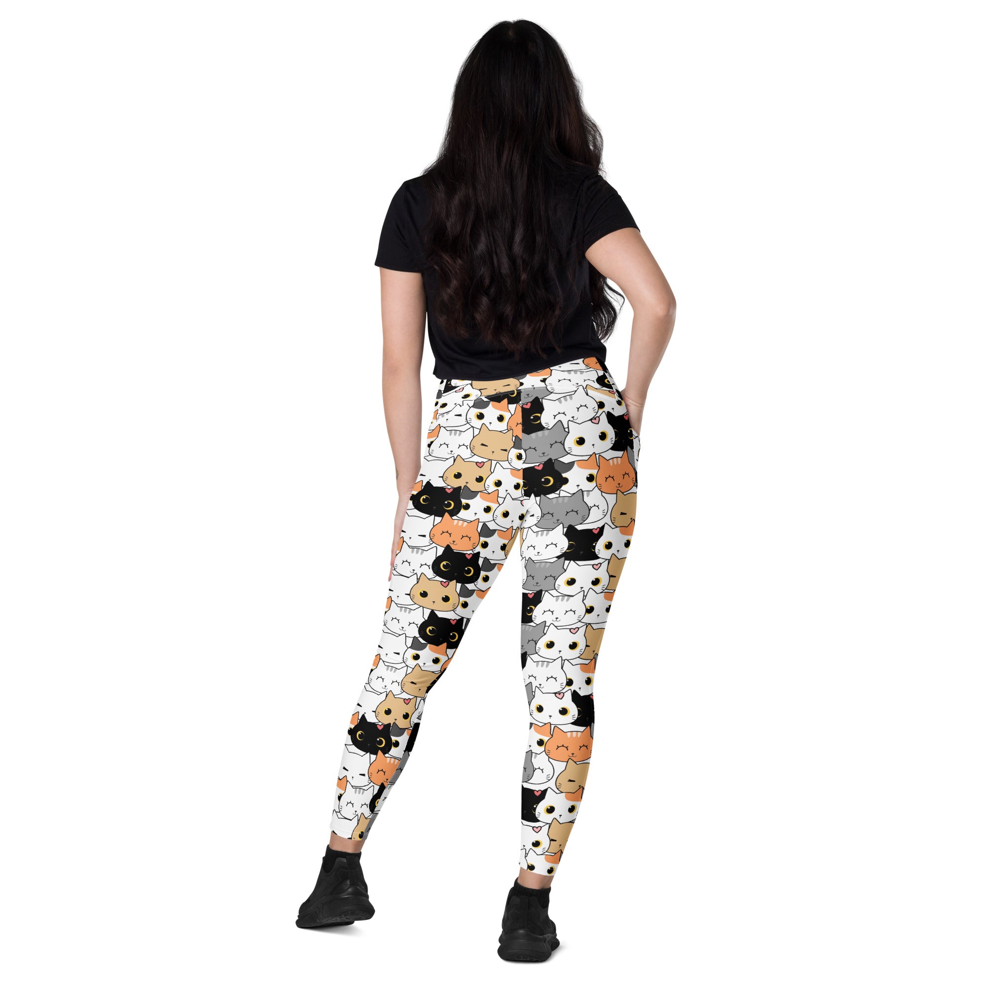 White women’s cat face yoga leggings with pockets featuring colorful cartoon cats in soft compression fabric