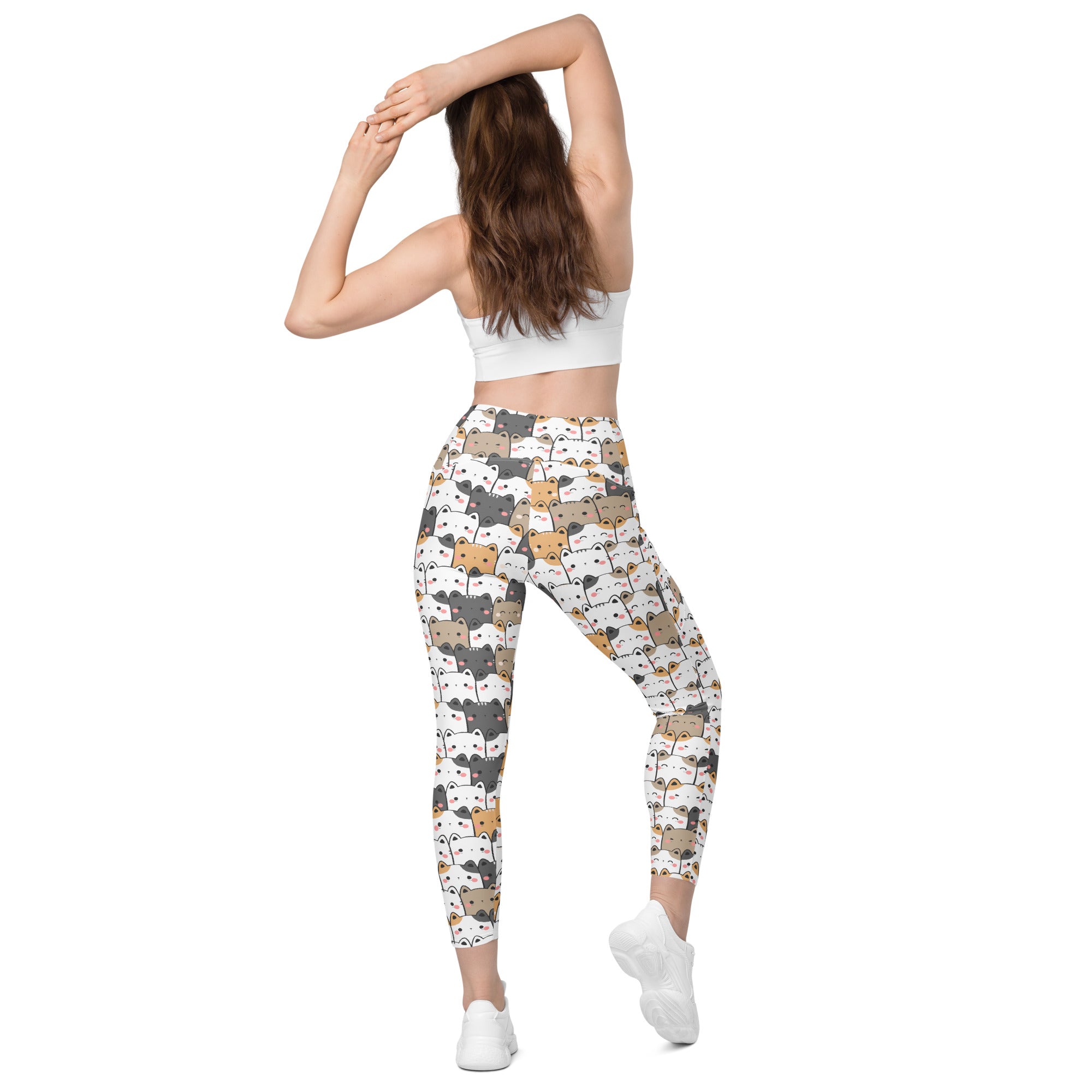 White women’s kawaii cat yoga leggings with pockets featuring playful gray brown and white cartoon cats on soft compression fabric
