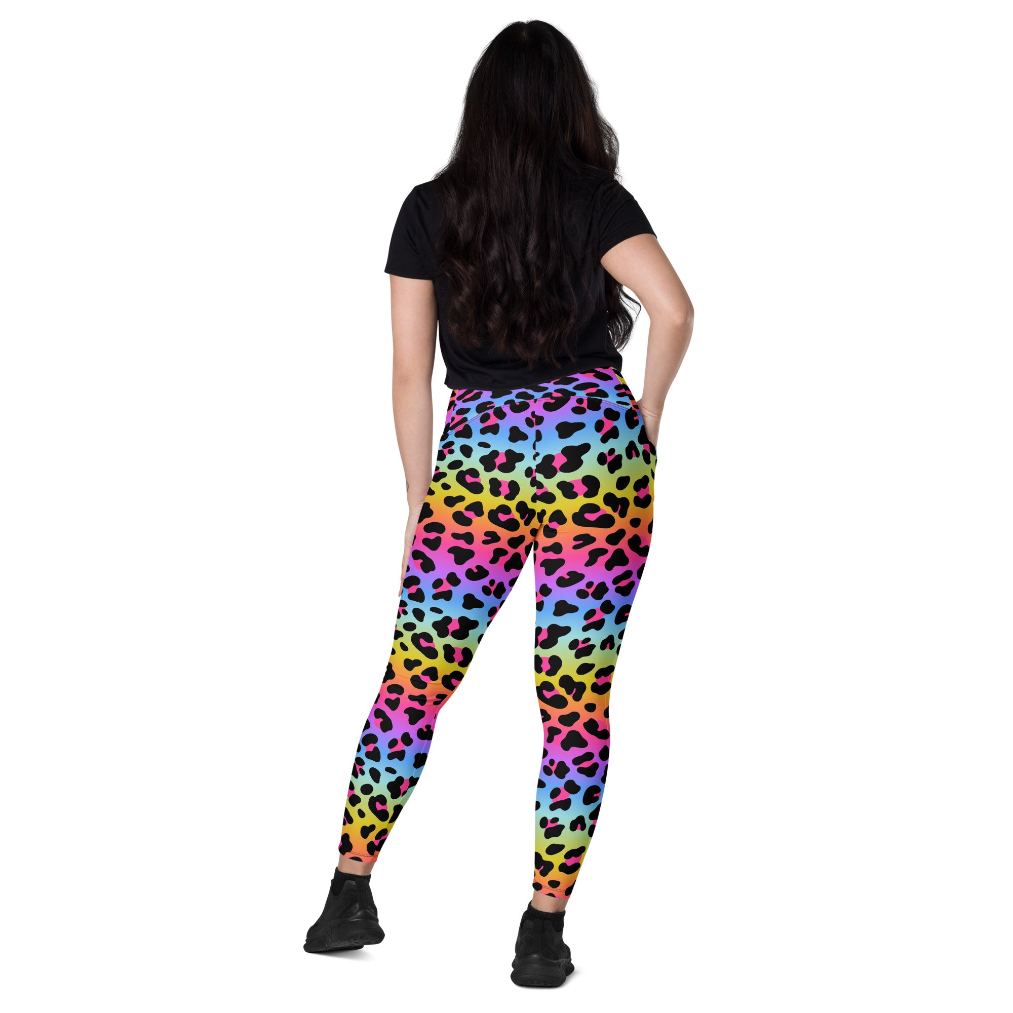 Women’s high-waisted rainbow leopard yoga leggings with pockets in soft compression fabric gradient pink to blue