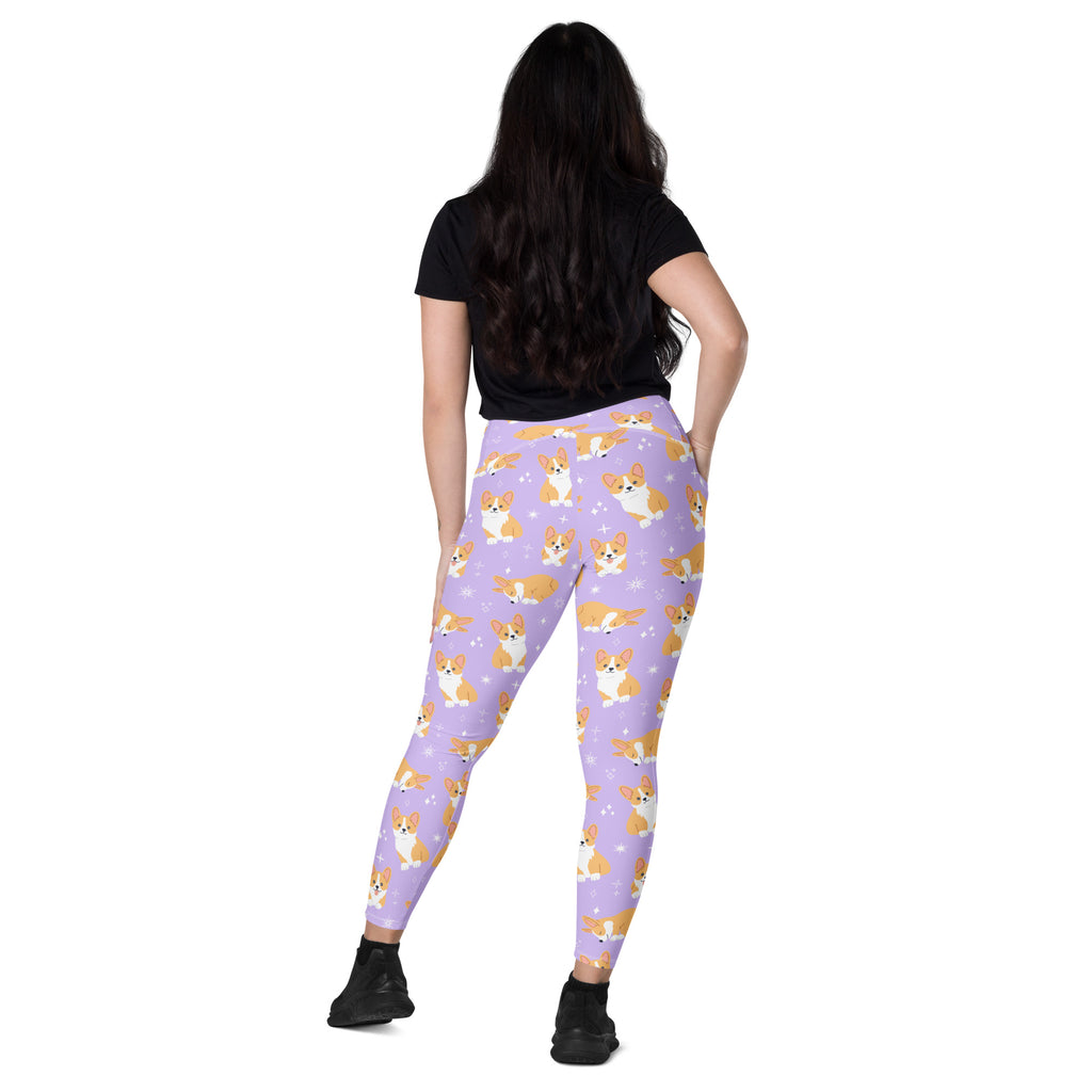 Women’s purple high waisted soft compression yoga leggings with pockets featuring tan and white cartoon corgis pattern