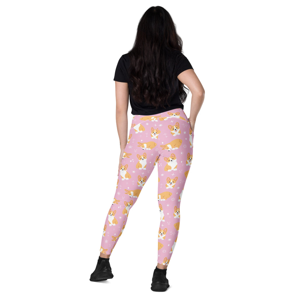 Women’s pink high-waisted corgi dog yoga leggings with pockets featuring soft compression fabric and cute tan white corgis
