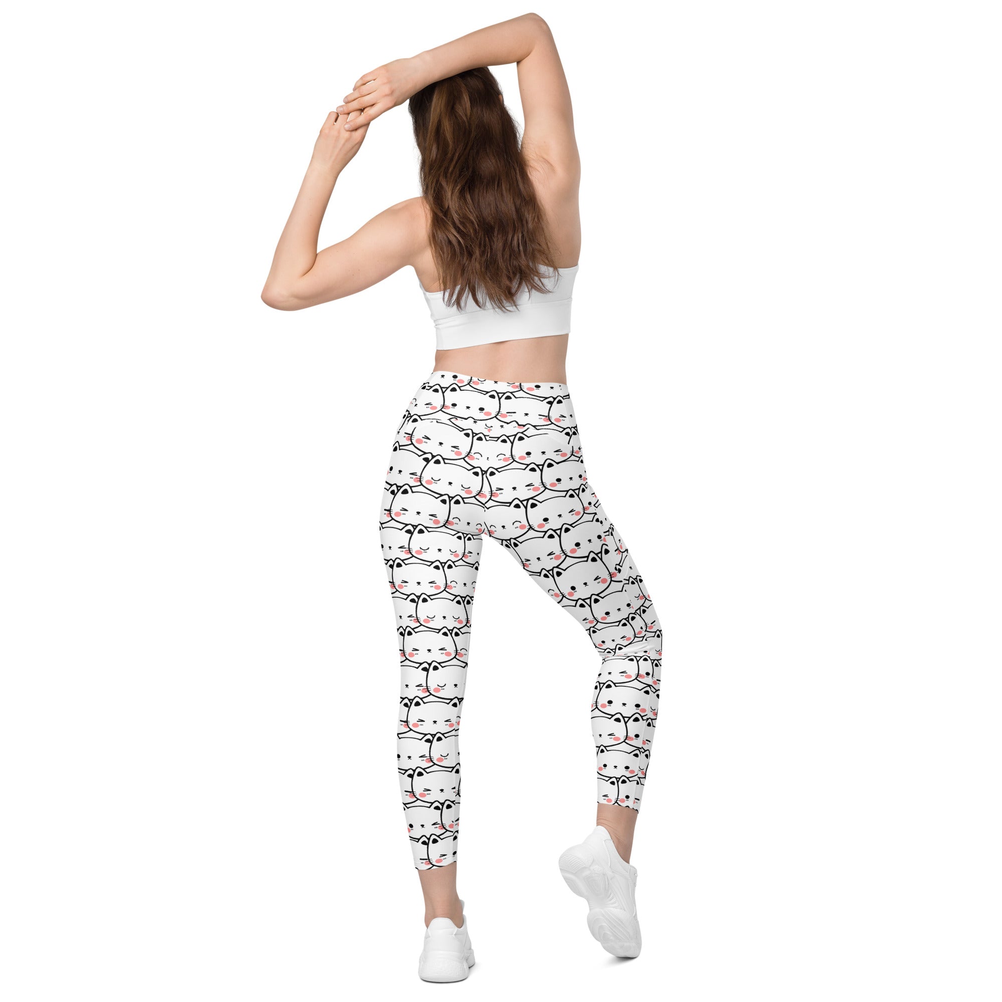 White women’s kawaii cat face yoga leggings with pockets high-waisted soft compression fabric and black pink cat pattern