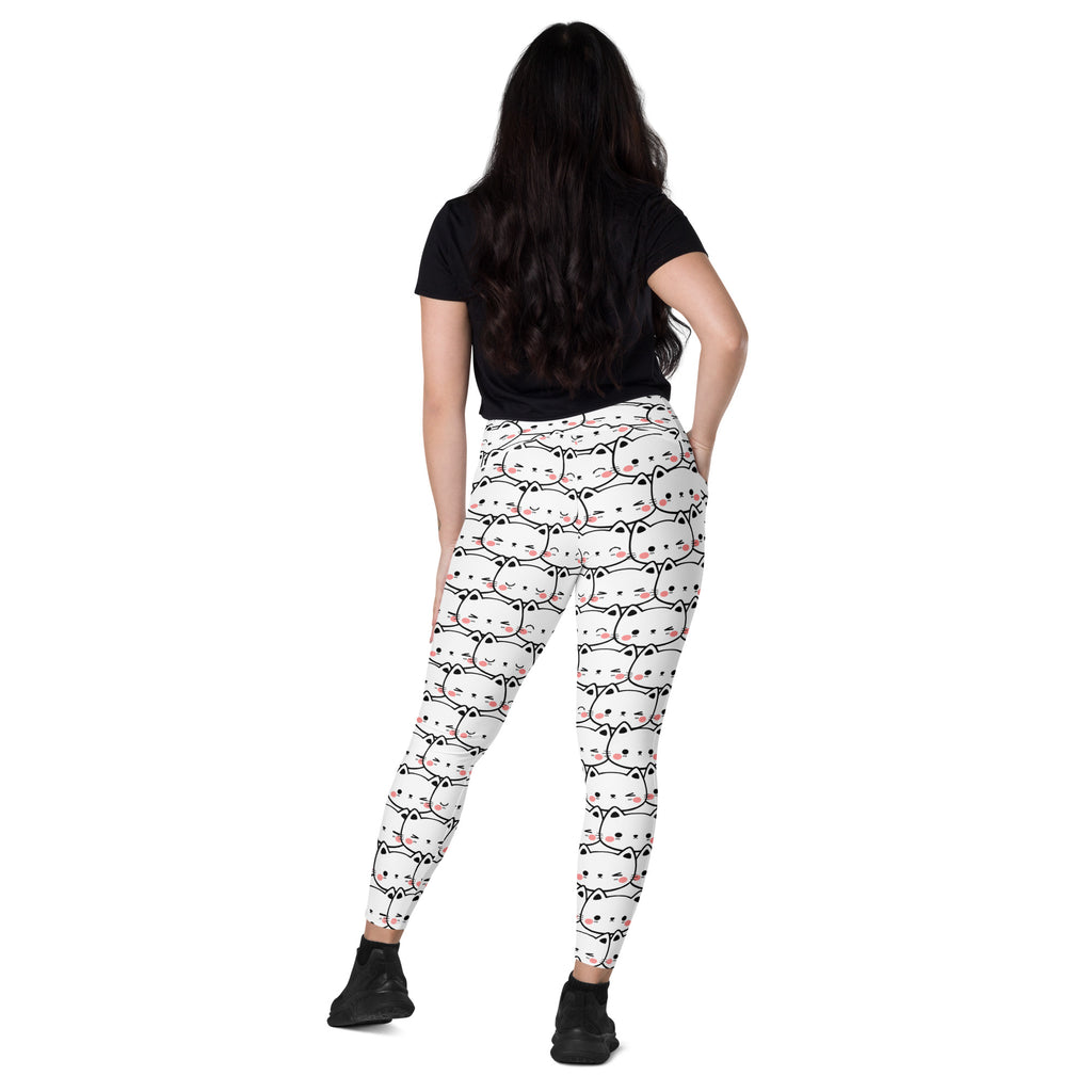 White women’s kawaii cat face yoga leggings with pockets featuring soft compression and cute black and white cat pattern