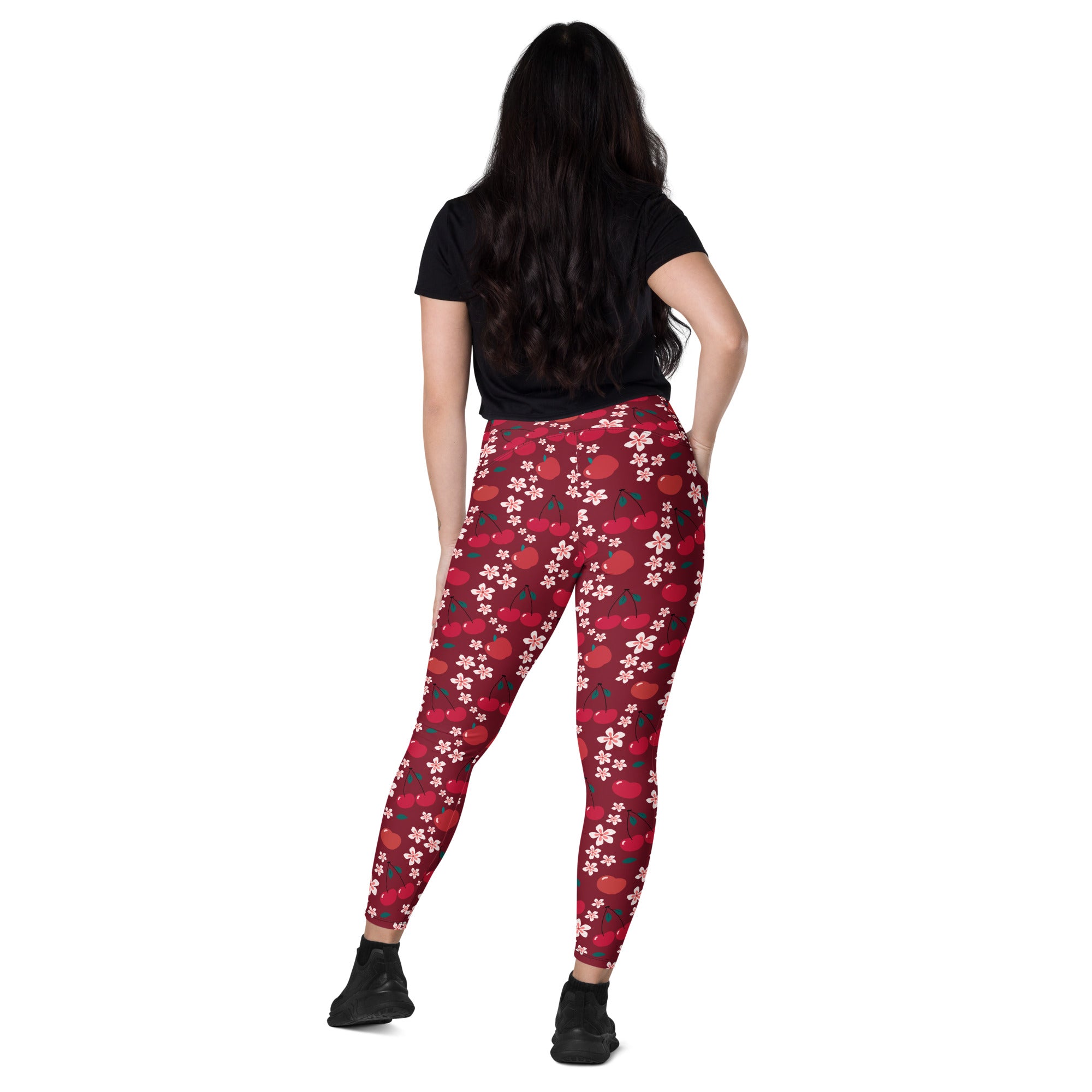 Women’s high-waisted cherry blossom yoga leggings with pockets in red cherry and white flower pattern for active wear