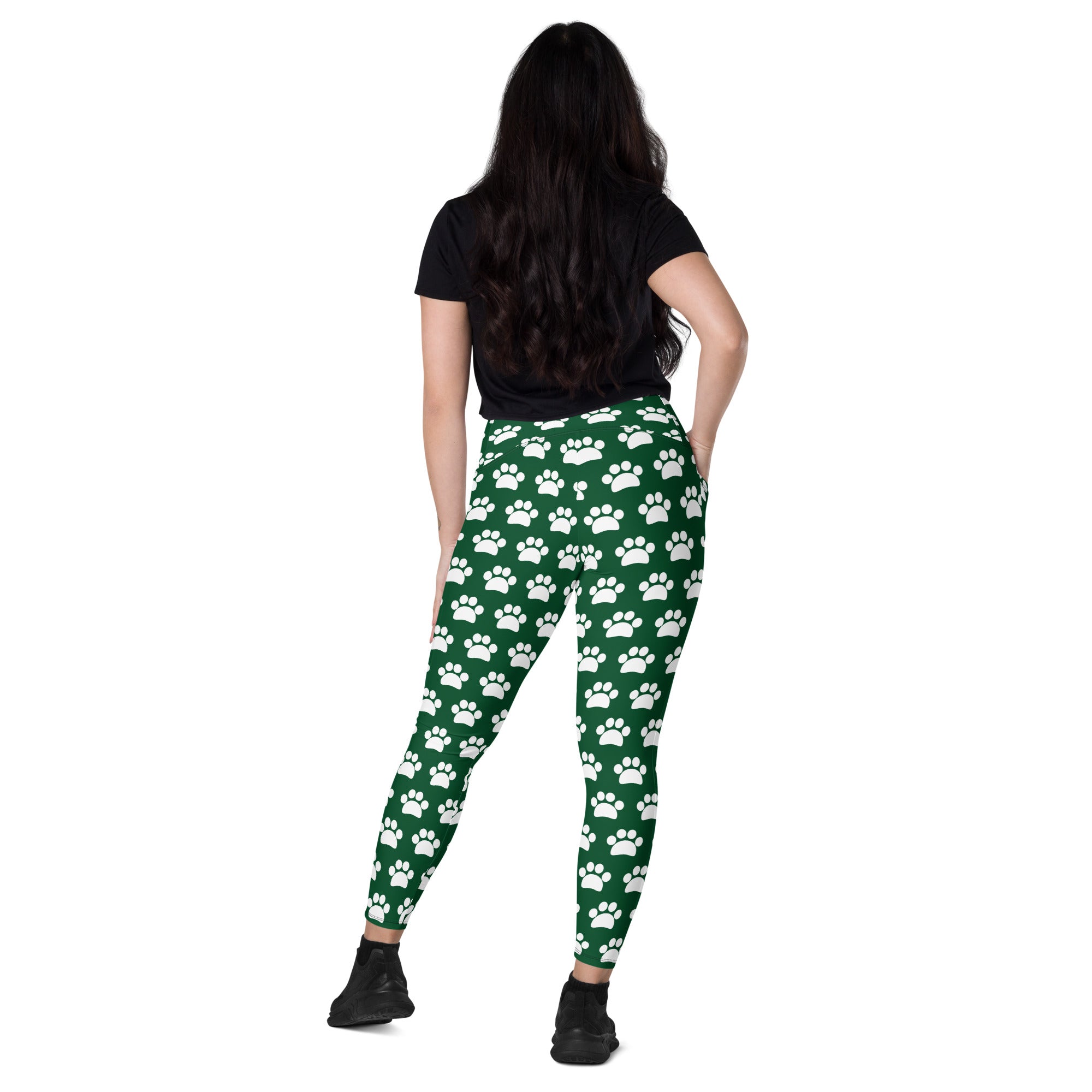 Women’s green high waisted yoga leggings with white paw prints soft compression fabric and pockets