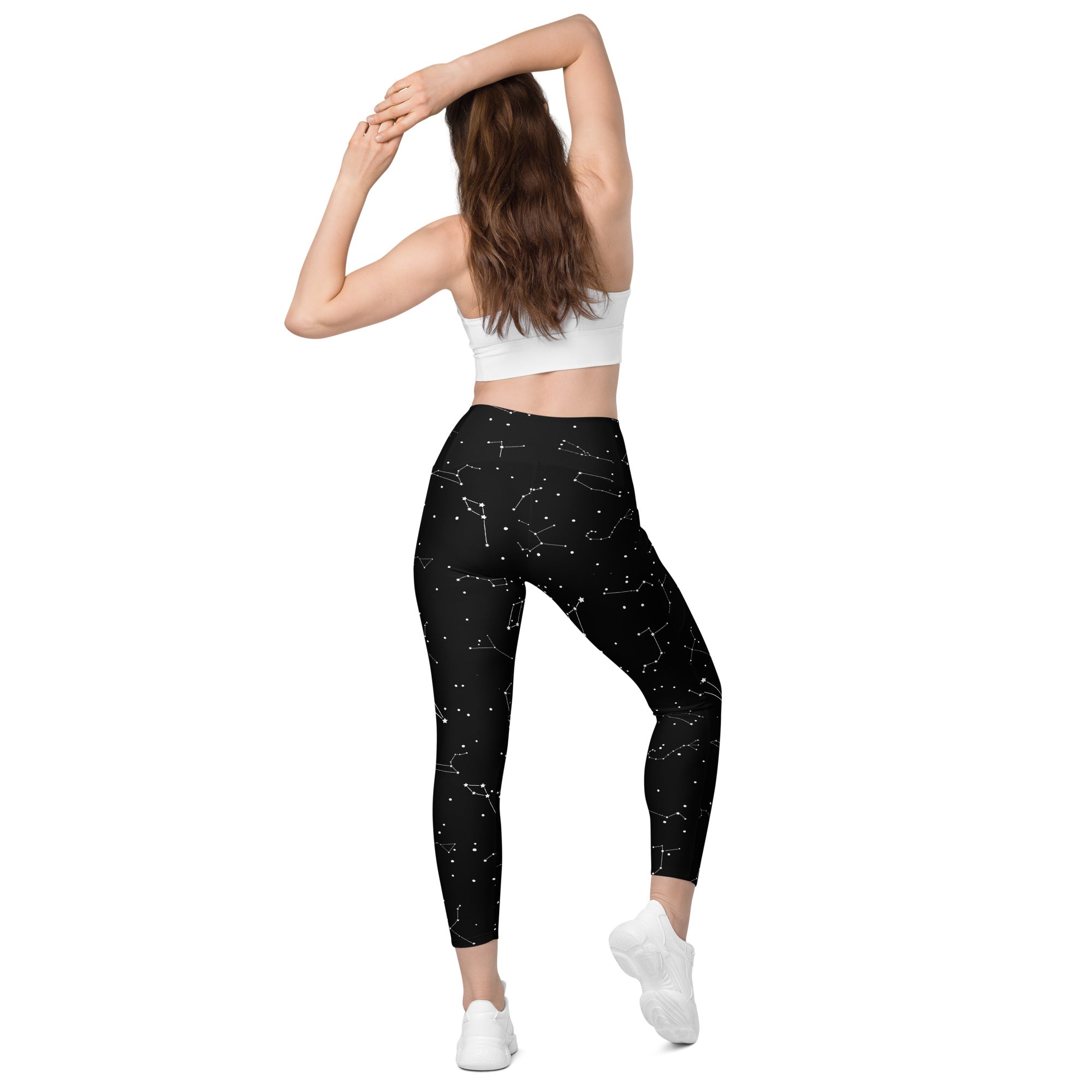 Black high-waisted women’s yoga leggings with white constellation pattern soft compression and pockets