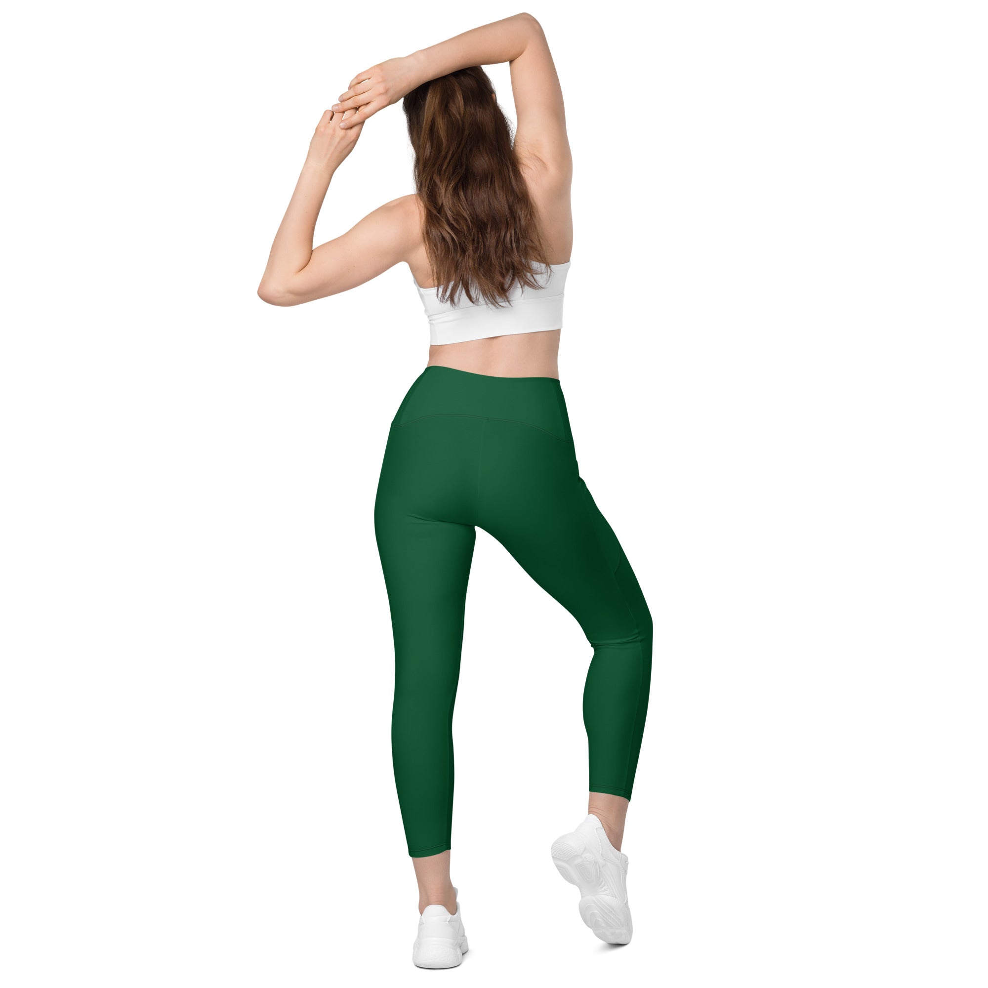 Women’s dark green high-waisted yoga leggings with pockets soft compression fit for activewear