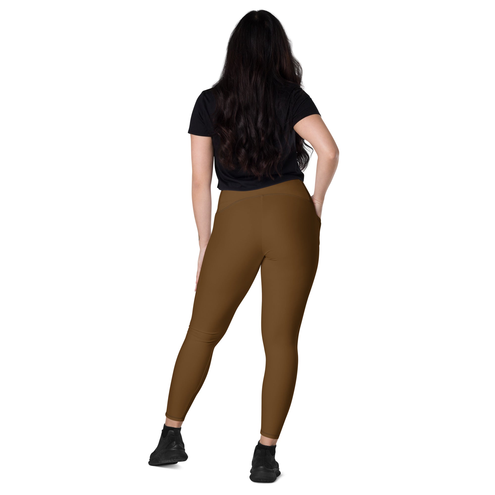 Women’s brown high-waisted yoga leggings with pockets made of smooth stretchy fabric for soft compression and active wear