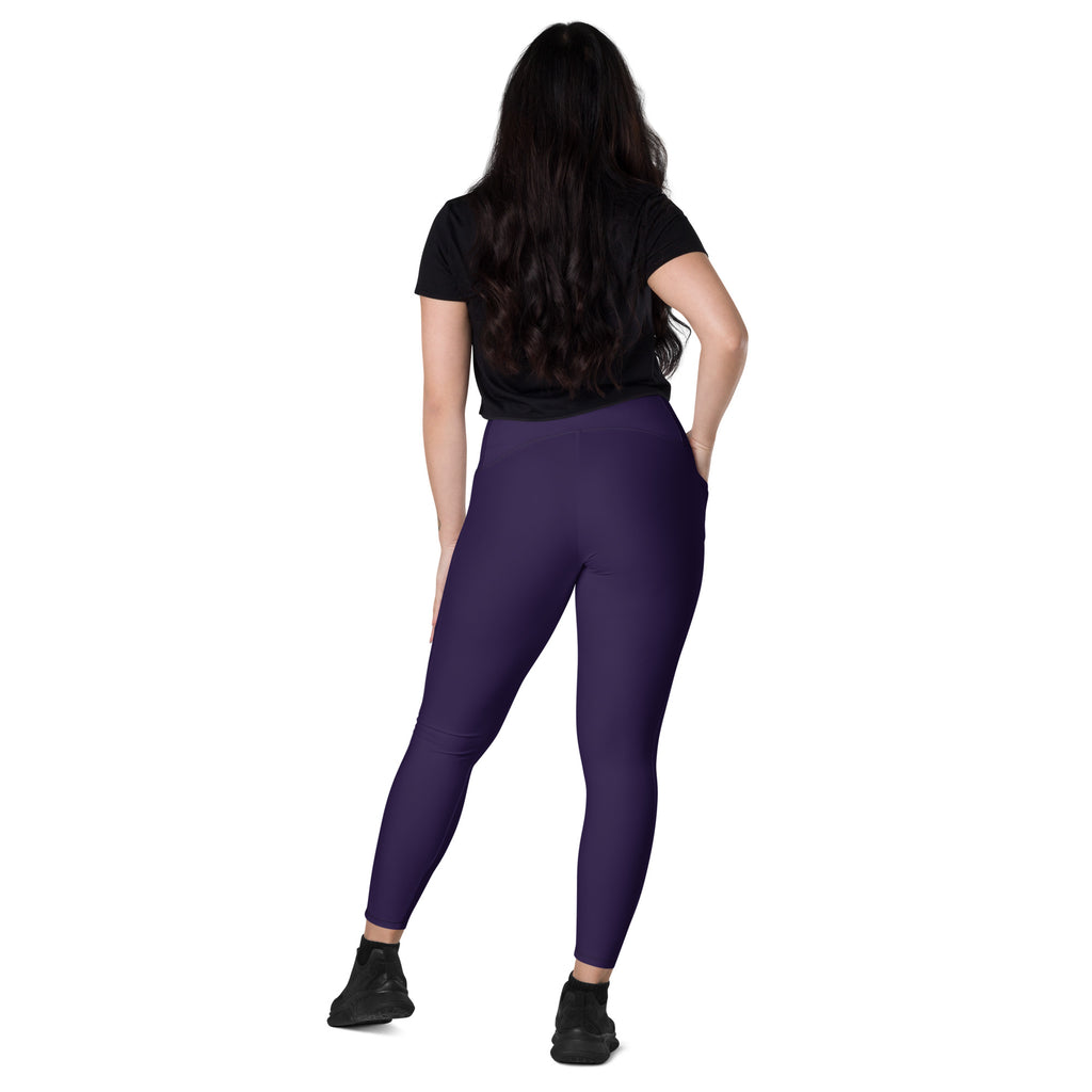 Women’s dark purple high-waisted yoga leggings with pockets made of soft compression fabric for activewear