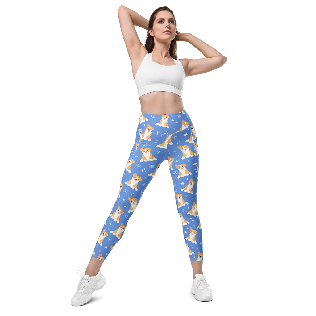 Women’s blue high waisted yoga leggings with pockets featuring a soft compression fabric and cartoon corgi pattern