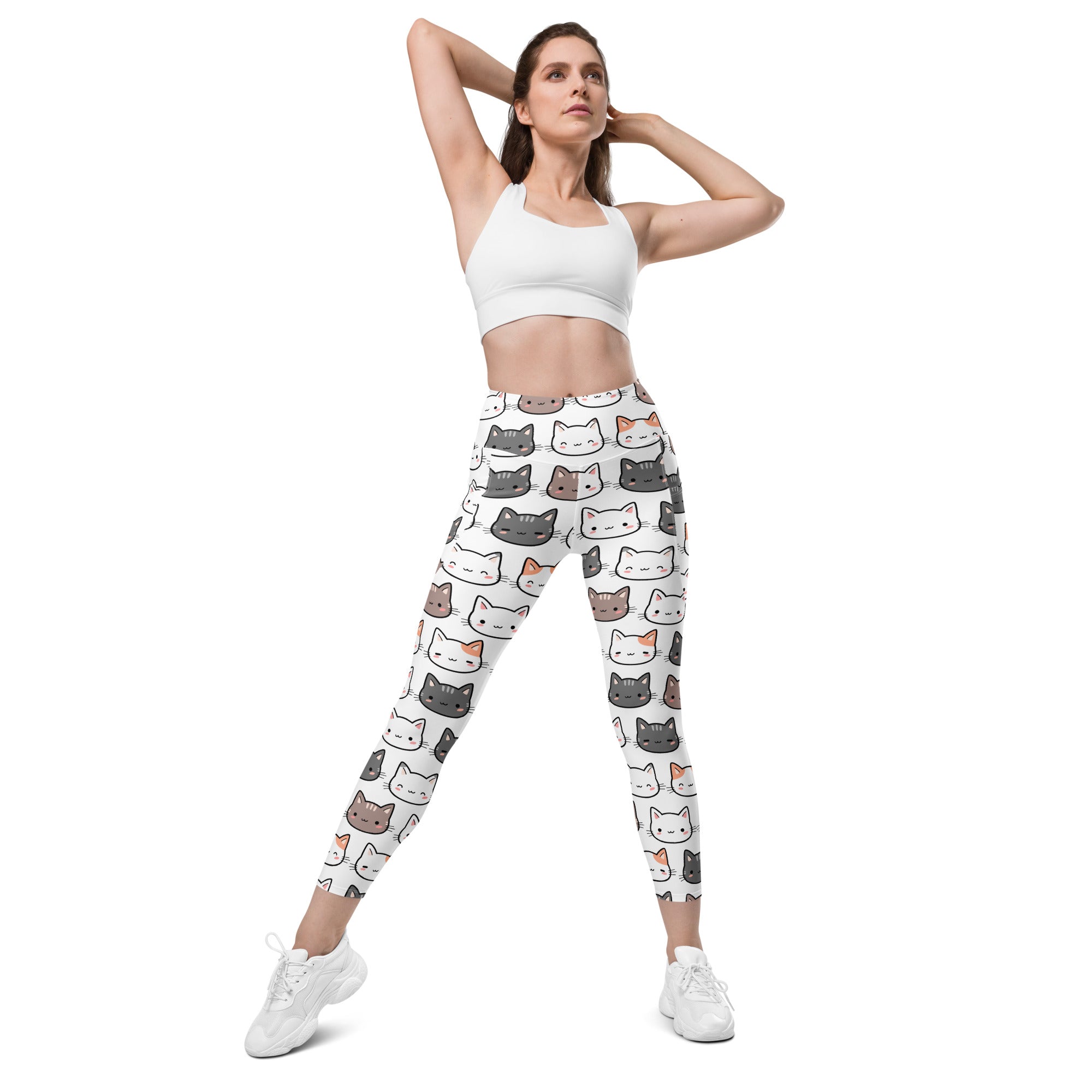 White women’s cute cat yoga leggings with pockets high-waisted soft compression fabric and colorful cartoon cat faces