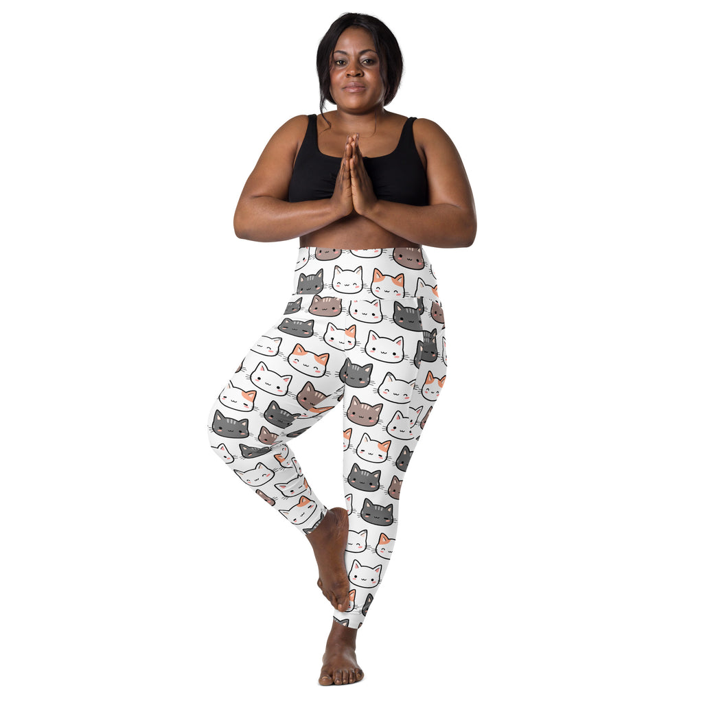 White women’s cute cat yoga leggings with pockets featuring playful gray white and orange cartoon cat faces pattern