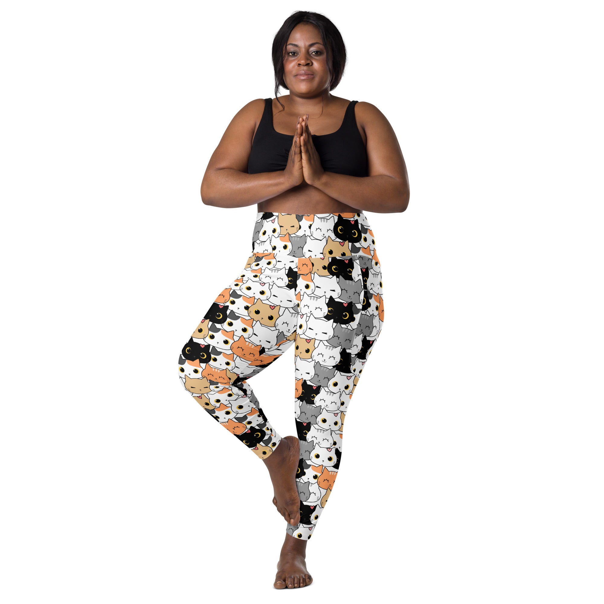 High-waisted women’s yoga leggings with pockets featuring a playful black white gray and orange cartoon cat pattern