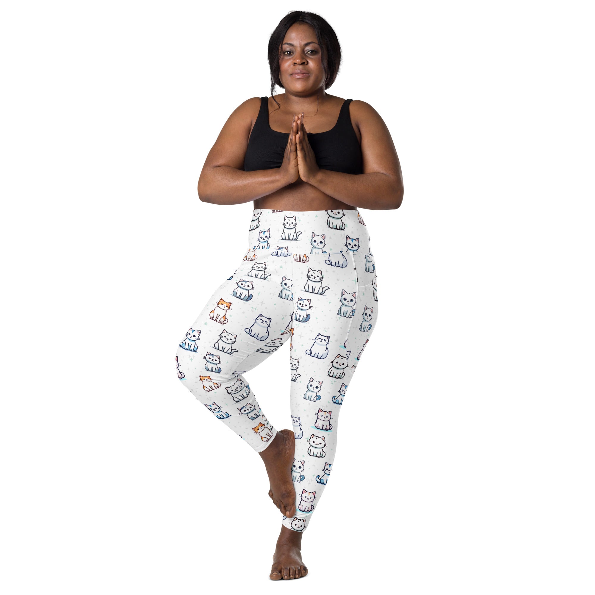 White high-waisted leggings with colorful cartoon cats pattern featuring soft compression and pockets for yoga