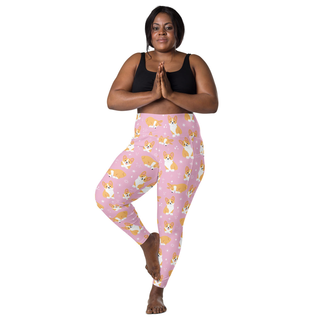 Women’s pink high waisted yoga leggings with soft compression and pockets featuring cartoon corgis and white stars