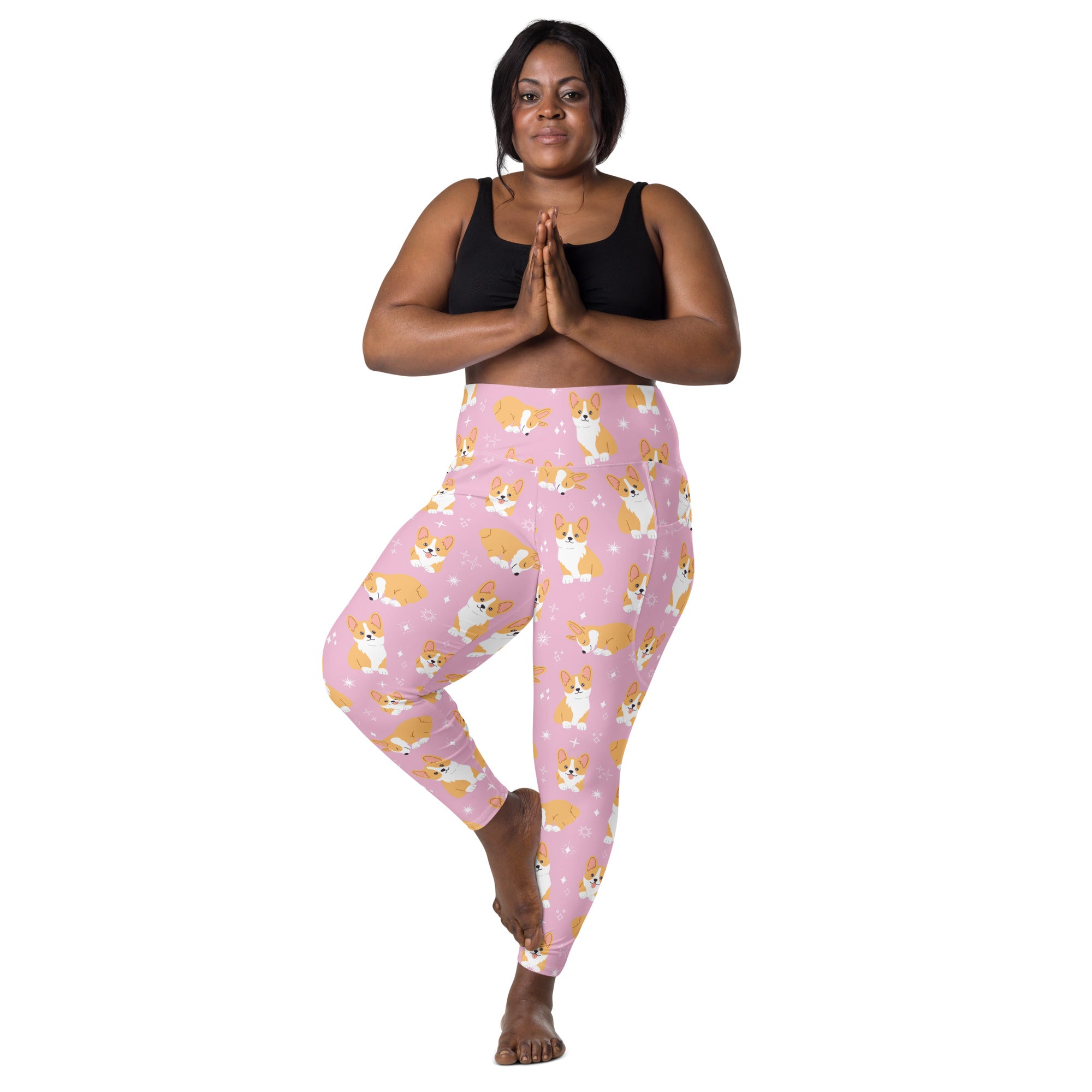 Women’s pink high waisted yoga leggings with soft compression and pockets featuring cartoon corgis and white stars
