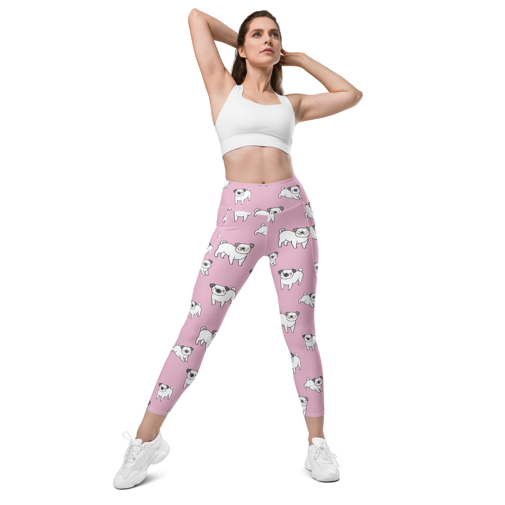 Women’s pink pug yoga leggings with pockets featuring a white cartoon pug pattern high-waisted soft compression pants