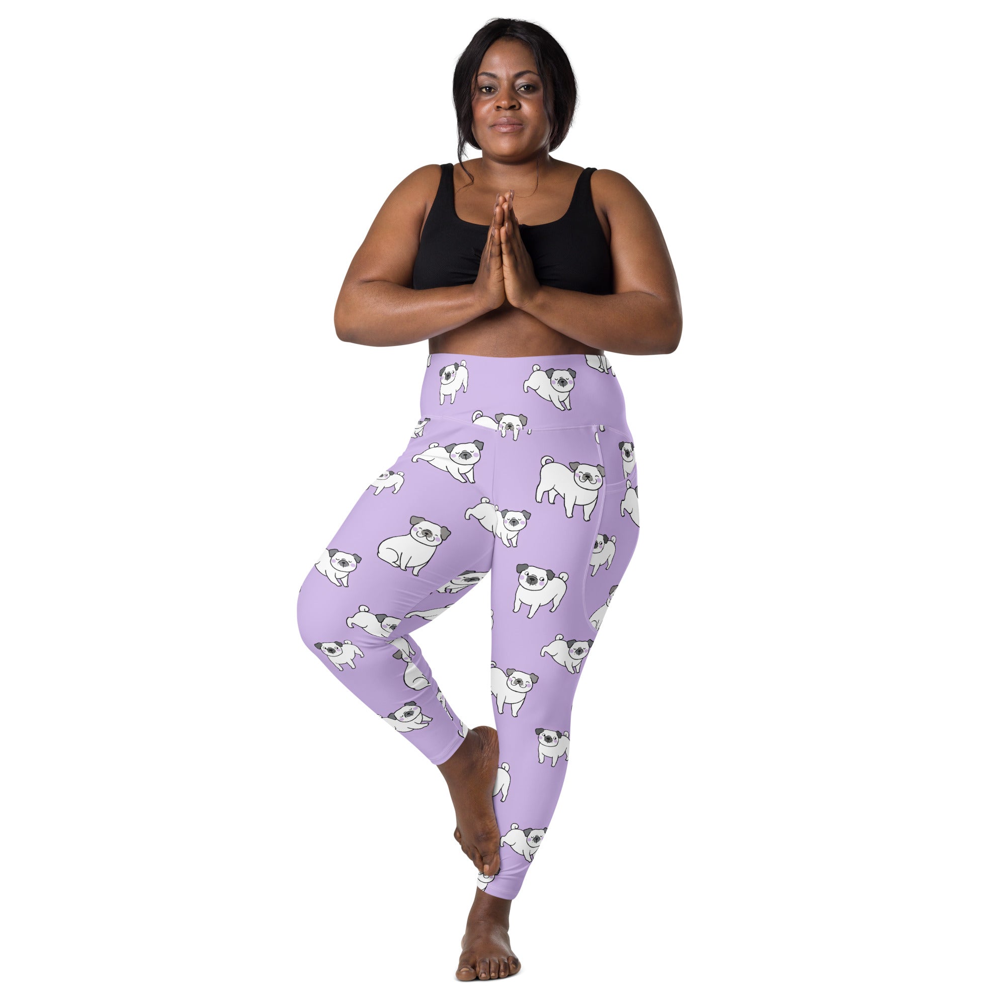 Women’s purple high-waisted pug yoga leggings with pockets featuring a soft compression fabric and playful white pug pattern