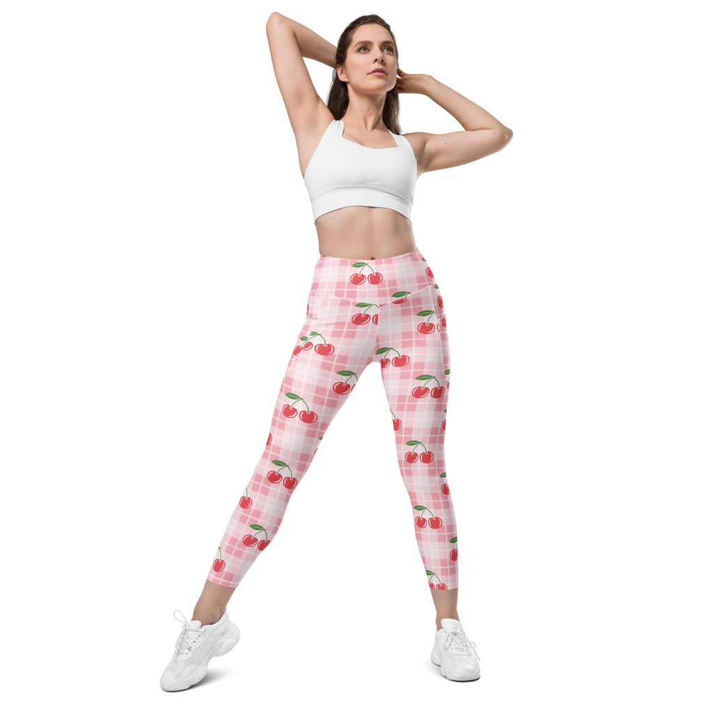 Women’s high-waisted pink cherry-patterned gingham yoga leggings with pockets and soft compression fabric