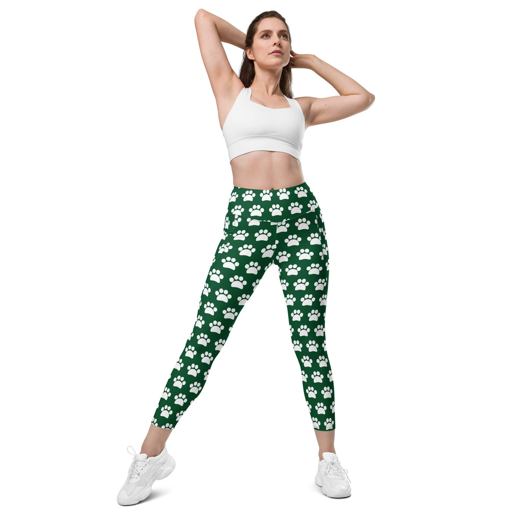 Women’s green paw print high waisted yoga leggings with pockets and soft compression fabric shown from front