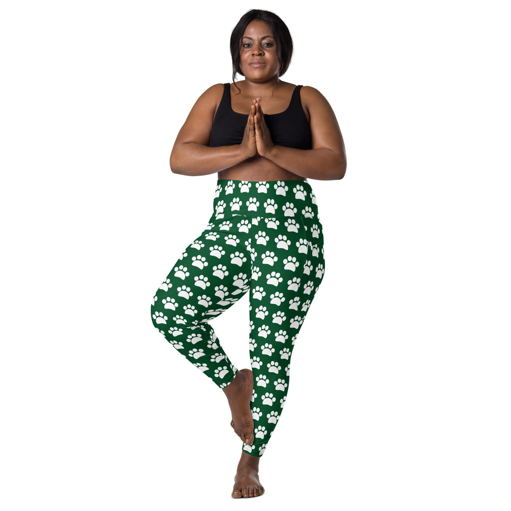 Women’s high waisted green yoga leggings with white paw prints soft compression fabric and pockets
