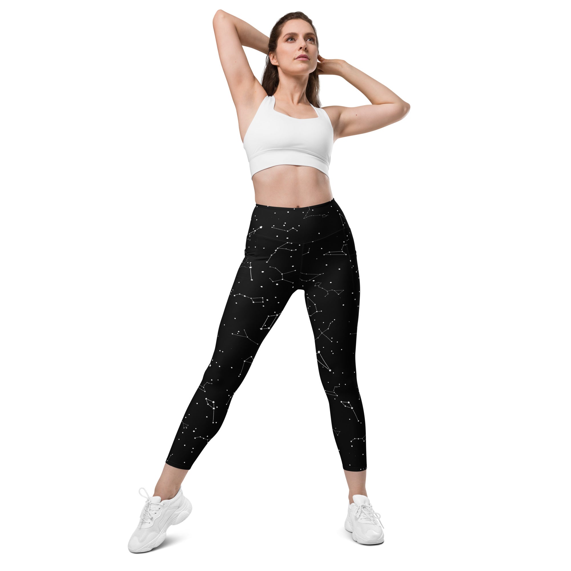 Women’s black high-waisted leggings with white constellation pattern soft compression fabric and pockets for yoga