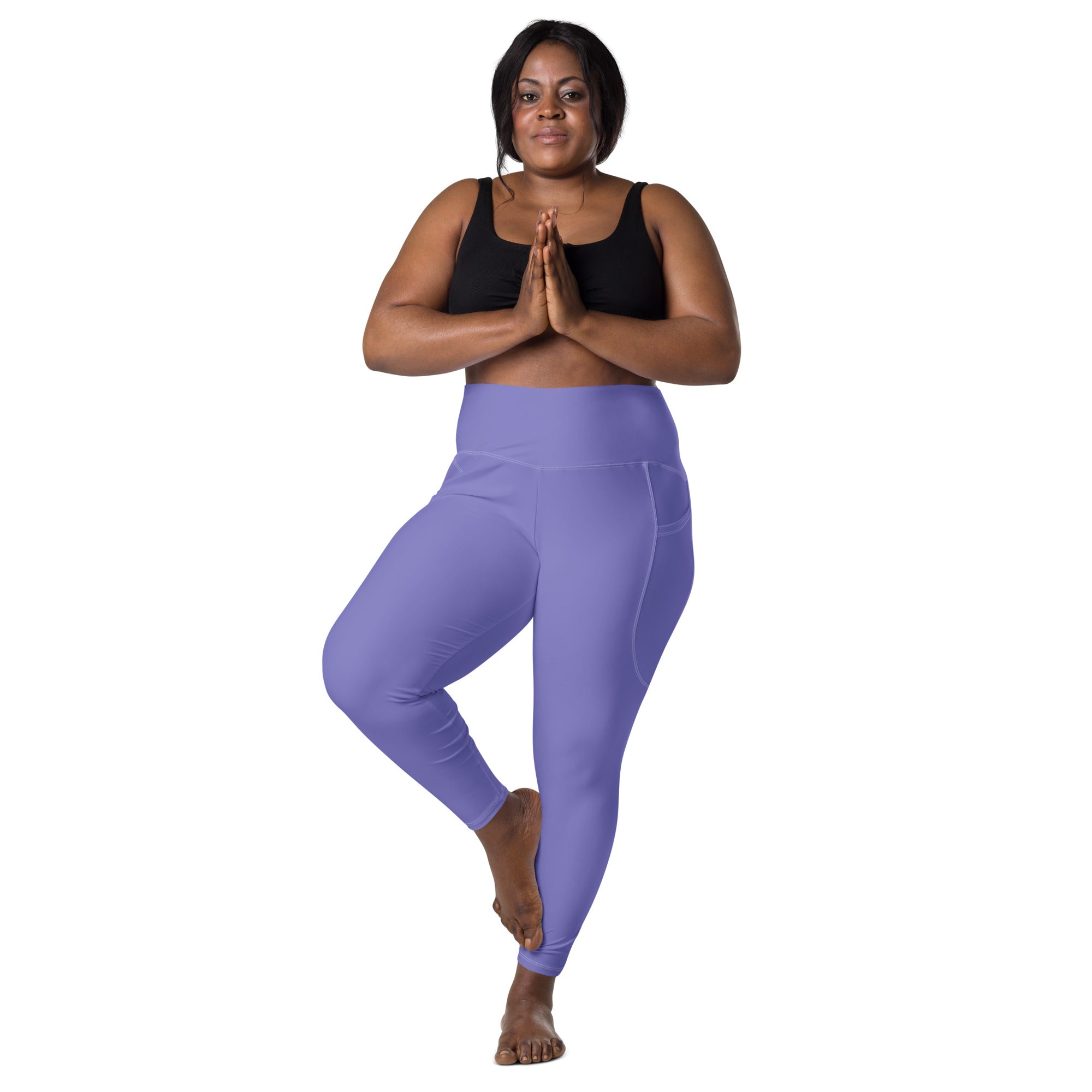Women’s lavender high-waisted yoga leggings with soft compression fabric and side pockets for active wear