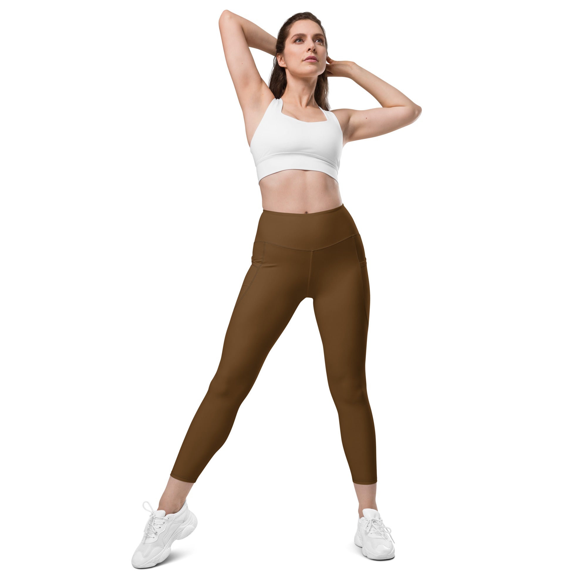 Women’s brown high-waisted yoga leggings with pockets made of smooth, soft compression material