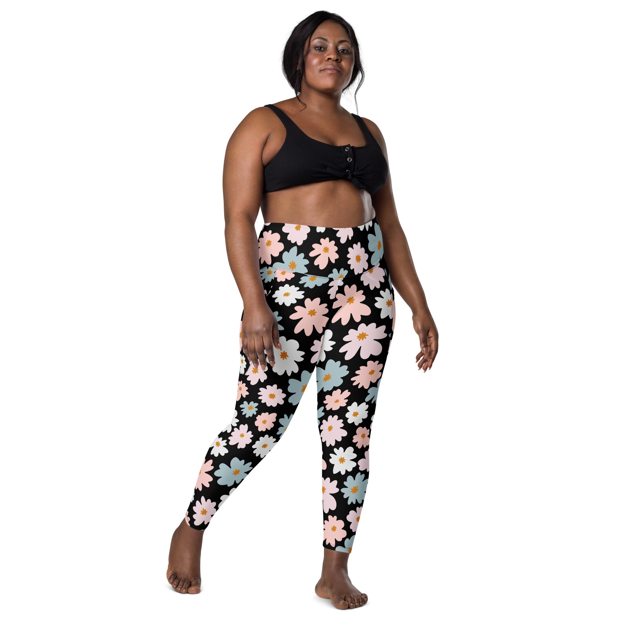Black leggings with vibrant pink white and light blue daisy pattern women’s retro floral high waisted yoga pants with pockets