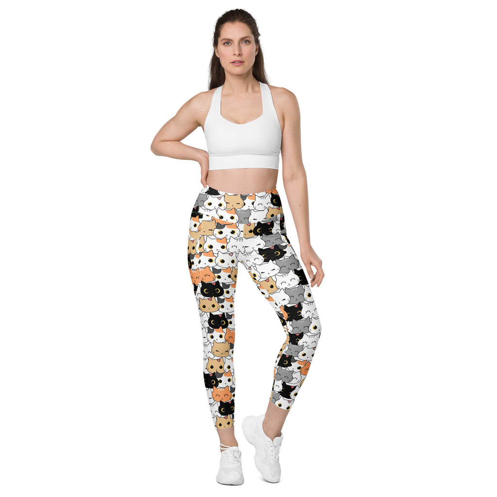 White women’s cat face yoga leggings with pockets featuring playful multicolor cartoon cats high-waisted soft compression