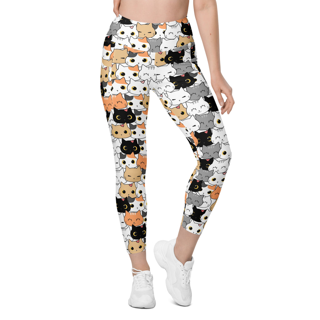 White women’s high-waisted cat face yoga leggings with pockets featuring colorful cartoon cat pattern and soft compression