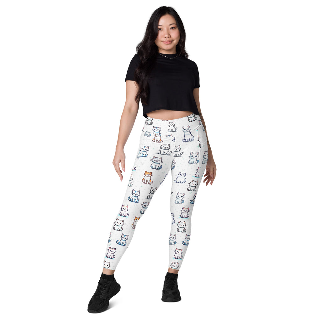 White high-waisted women’s cute kitten yoga leggings with pockets featuring playful multicolor cartoon cats pattern