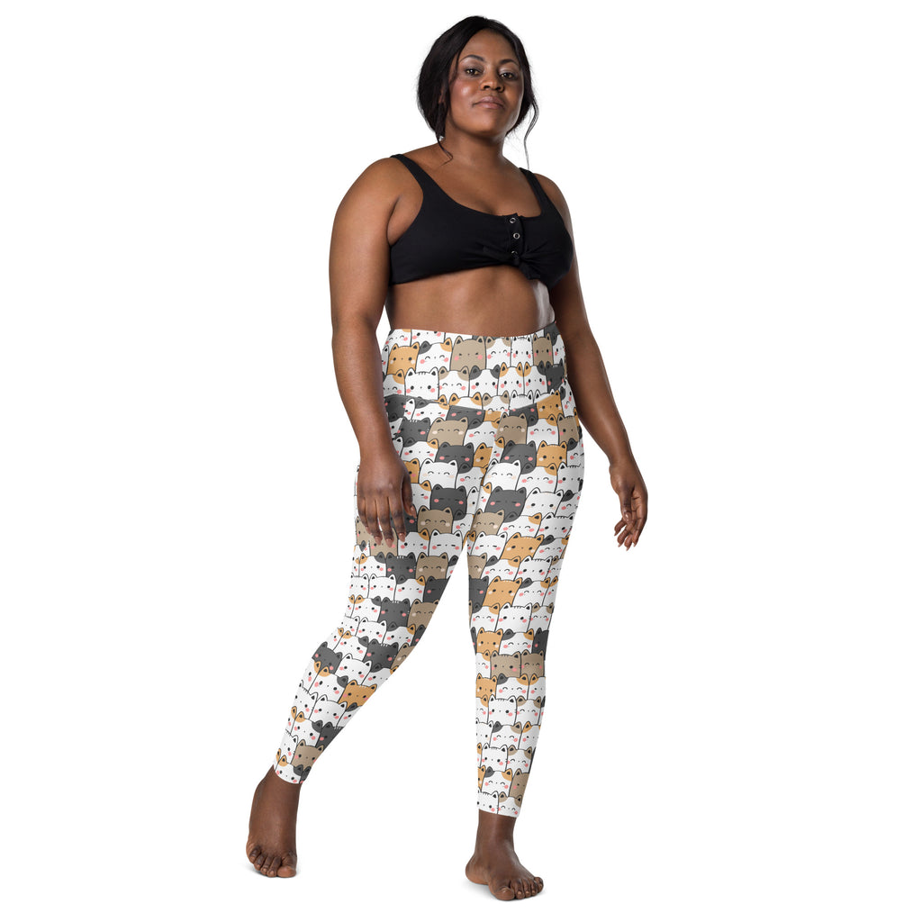 White kawaii cat yoga leggings with pockets featuring playful gray beige and black cartoon cat patterns