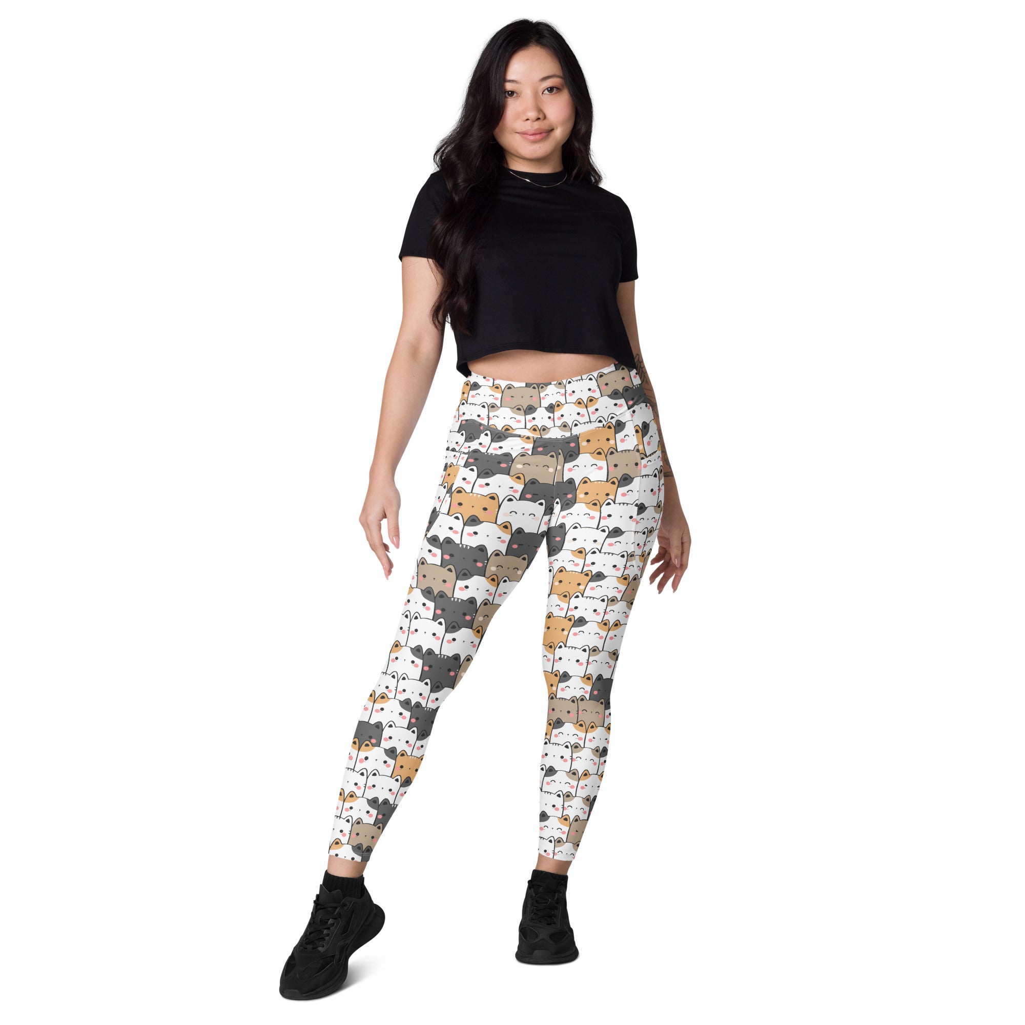 White women’s kawaii cat yoga leggings with pockets featuring playful gray beige and white cartoon cats in soft compression fabric