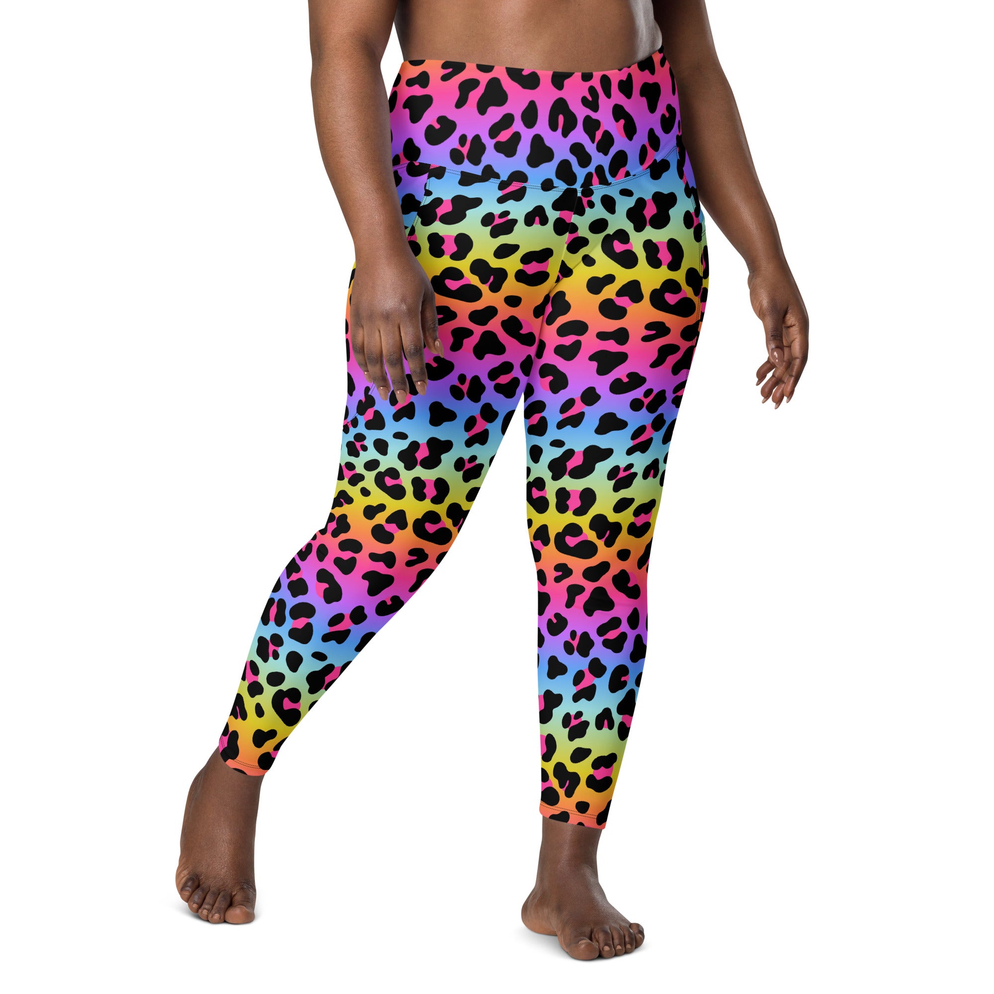 Women’s high-waisted rainbow gradient leopard print yoga leggings with pockets and soft compression fabric