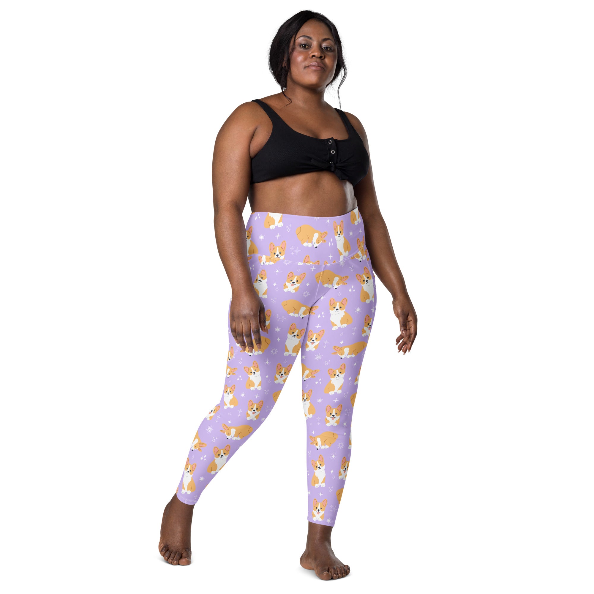 Women purple lavender yoga leggings with pockets featuring high-waisted soft compression fabric and tan white corgi pattern