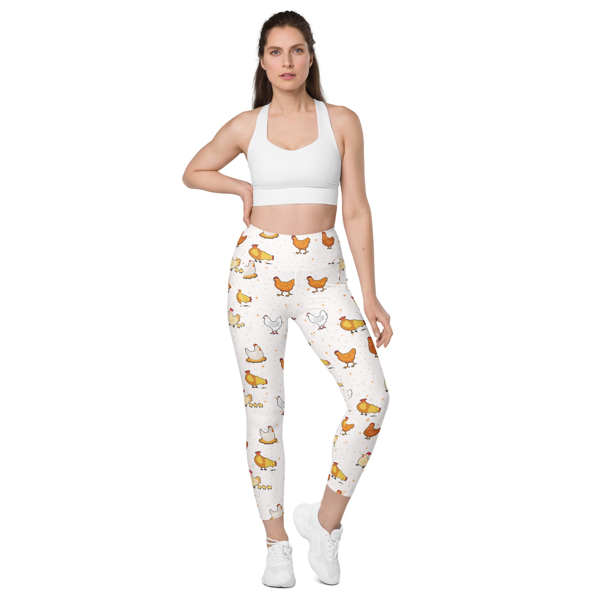 White women’s chicken yoga leggings with pockets featuring colorful cartoon chickens and soft compression fabric
