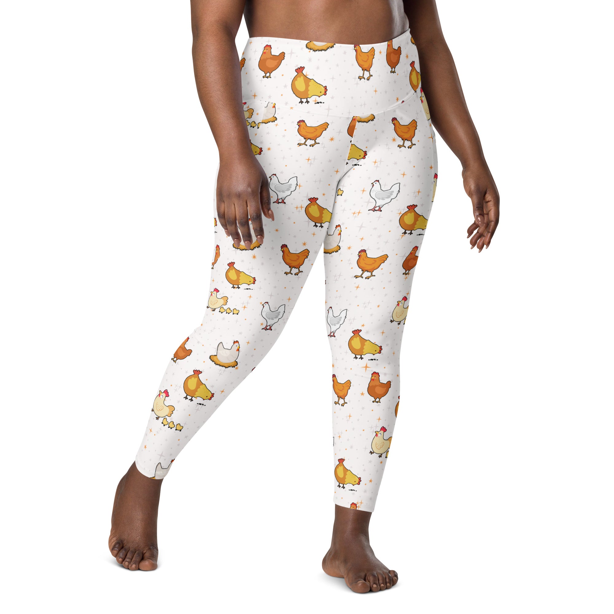 Women’s white high-waisted chicken yoga leggings with pockets featuring orange and white cartoon chickens and chicks