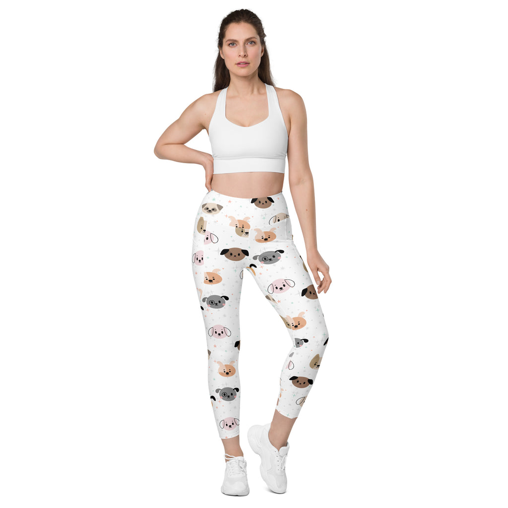 White women’s dog face yoga leggings with pockets featuring playful multicolor cartoon dog pattern and soft compression