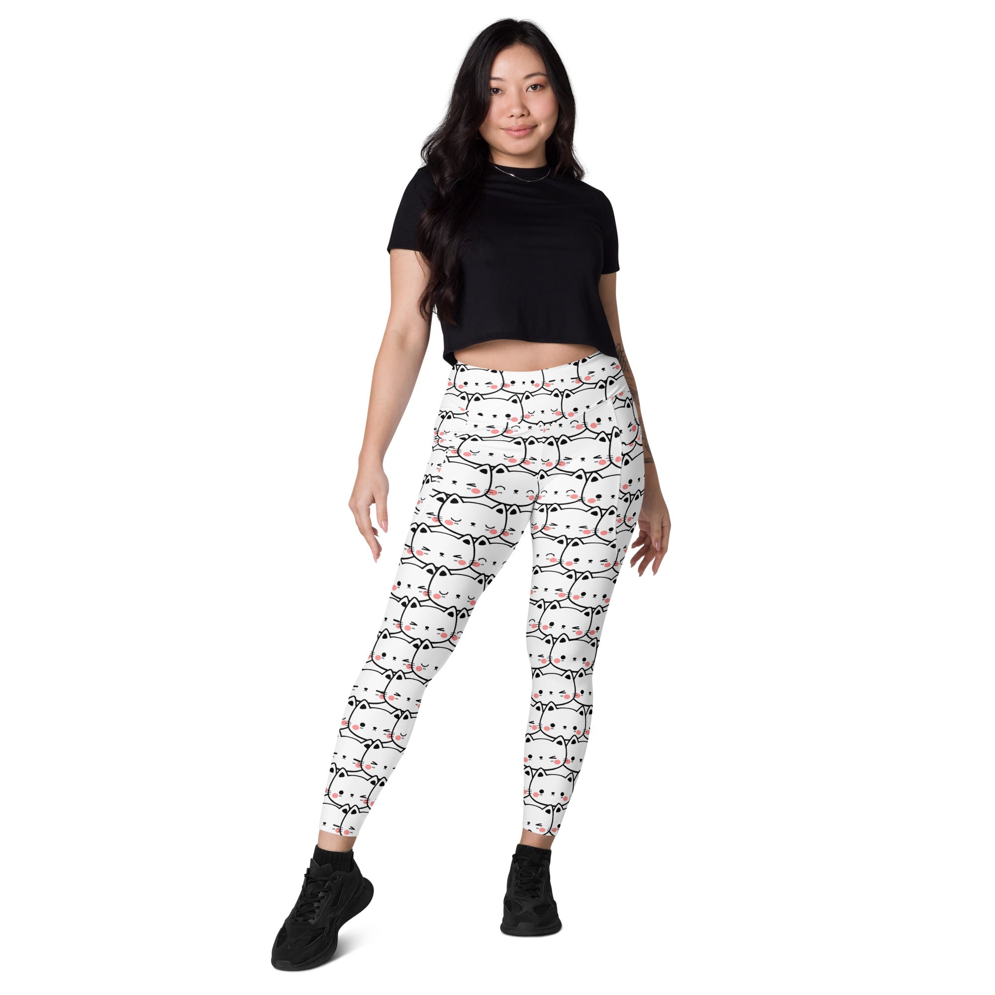 White kawaii cat face yoga leggings with pockets featuring soft high-waisted compression fabric and pink accents