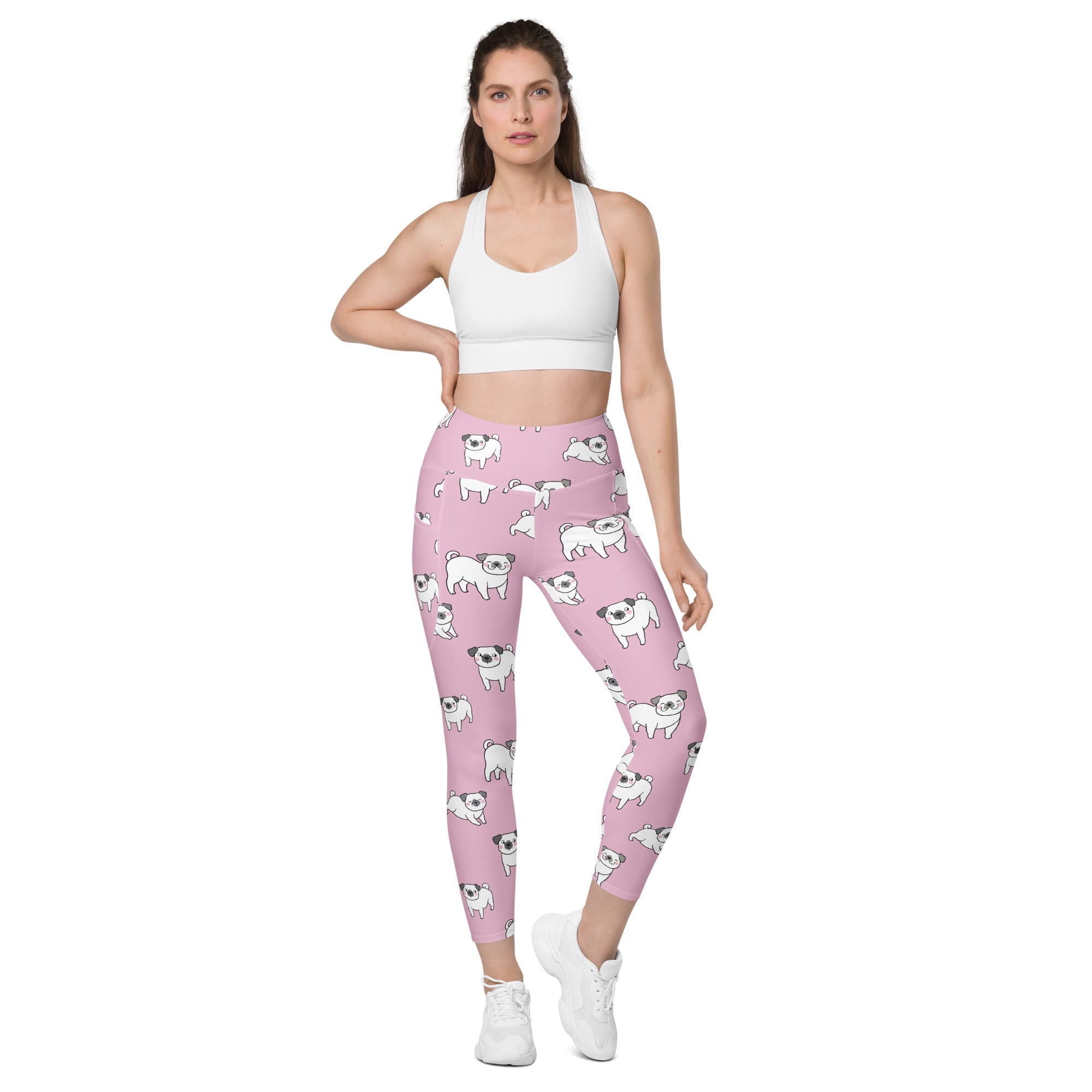 Women’s pink high-waisted yoga leggings with white pug pattern soft compression fabric and pockets for active wear